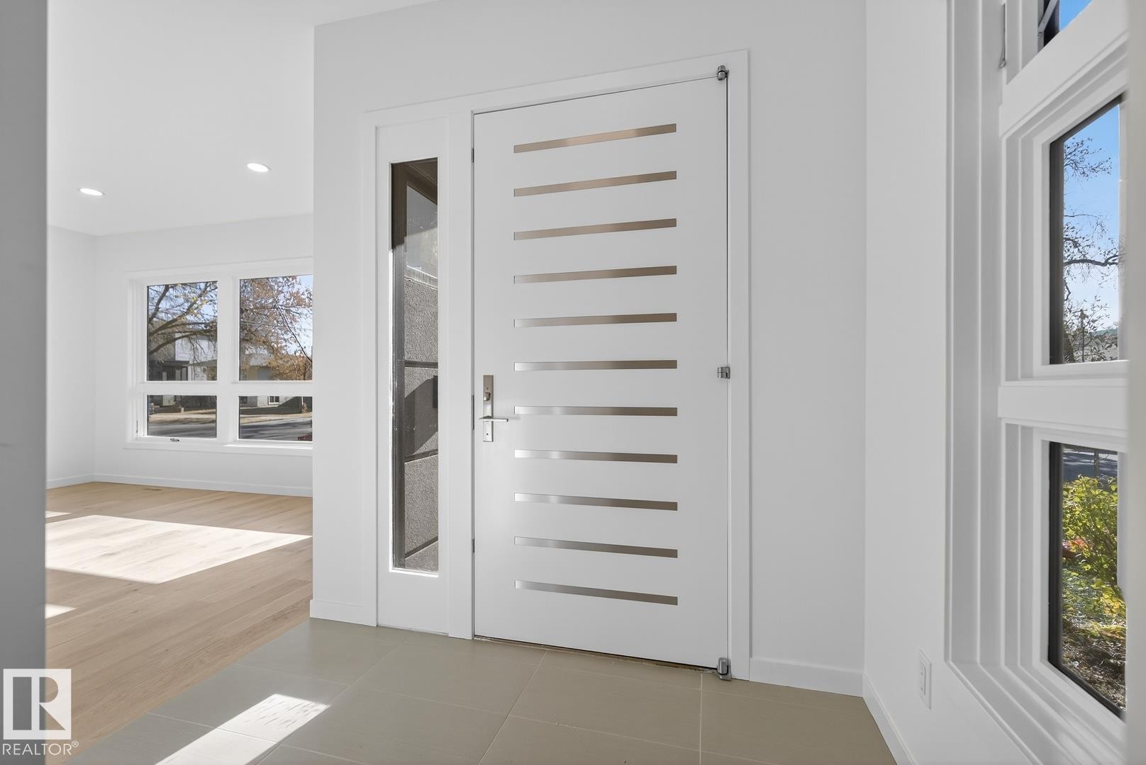 Detailed view of baseboards and recessed lighting - 14502 103 Avenue, Edmonton, AB - Indoor Photo Showing Other Room