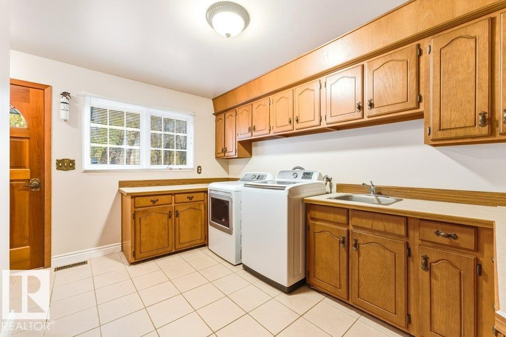 7550 Ellerslie Road, Edmonton, AB - Indoor Photo Showing Laundry Room