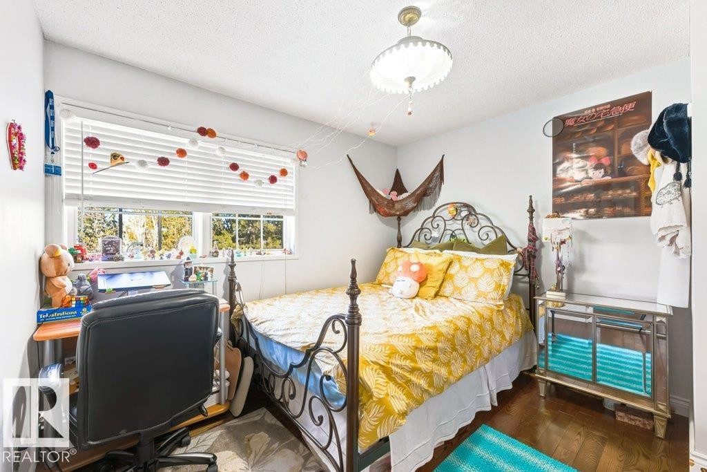 7550 Ellerslie Road, Edmonton, AB - Indoor Photo Showing Bedroom