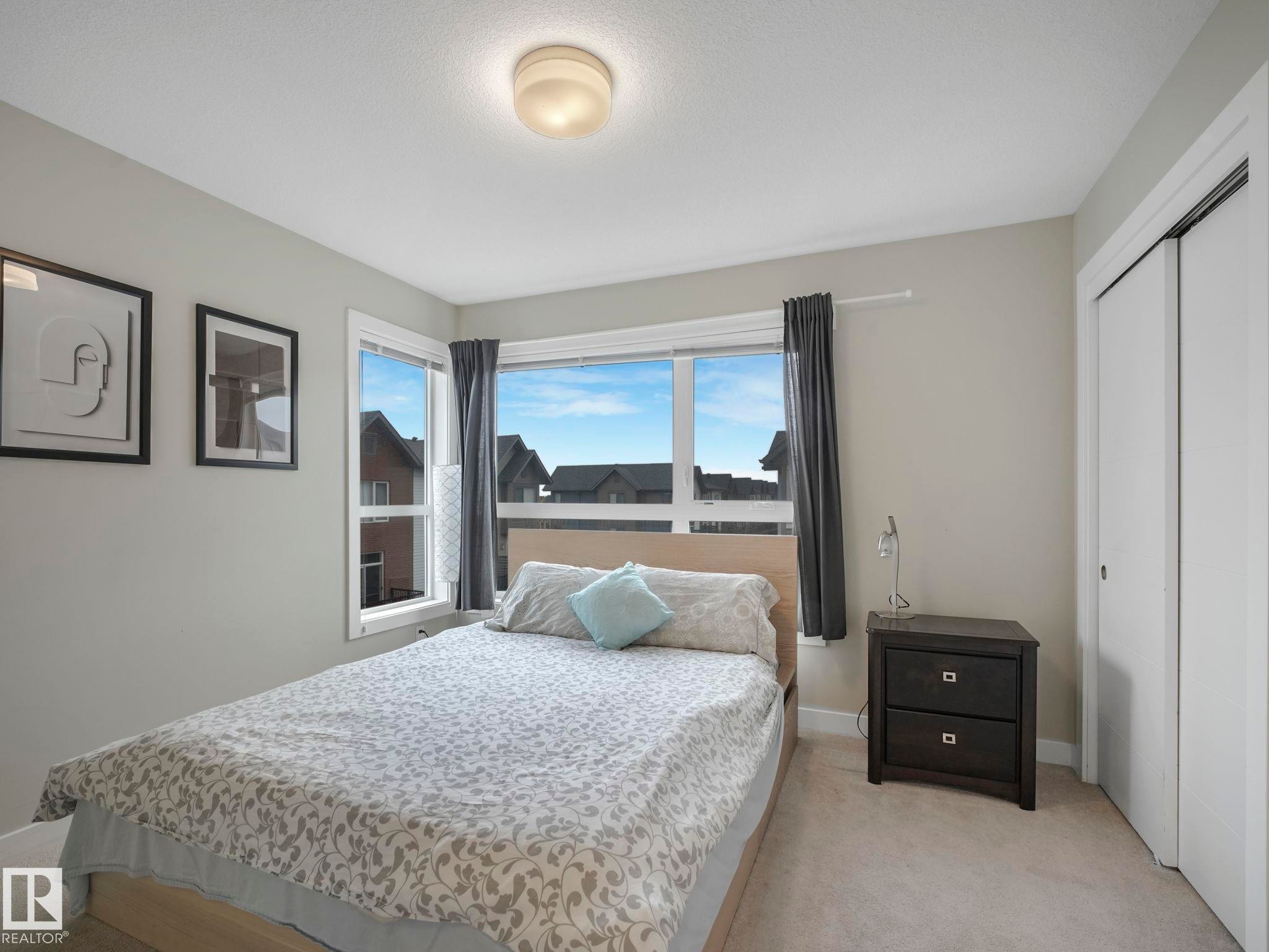 124 2560 Pegasus Boulevard, Edmonton, AB - Indoor Photo Showing Bedroom