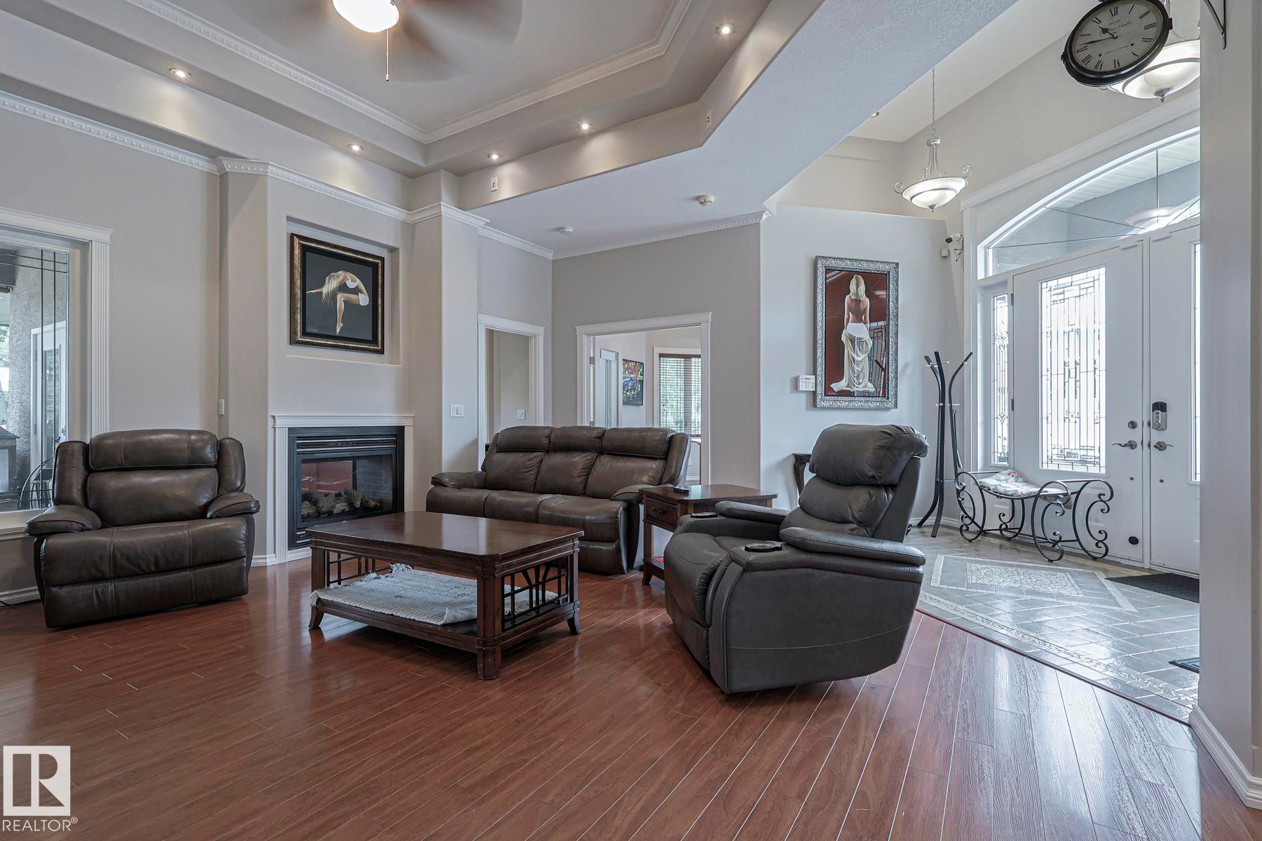4 Third Avenue, Entwistle, AB - Indoor Photo Showing Living Room With Fireplace
