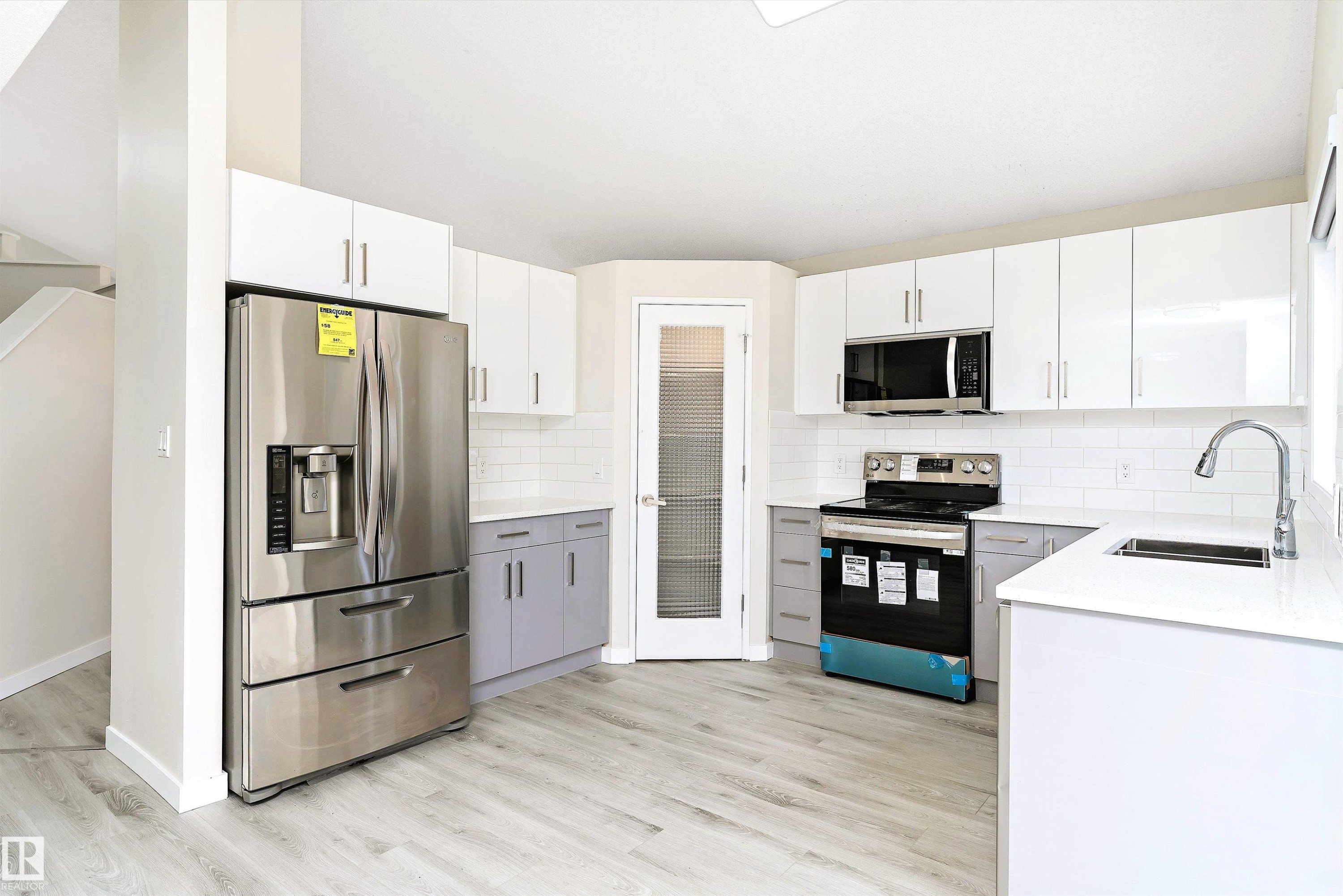 12828 144 Avenue, Edmonton, AB - Indoor Photo Showing Kitchen With Double Sink
