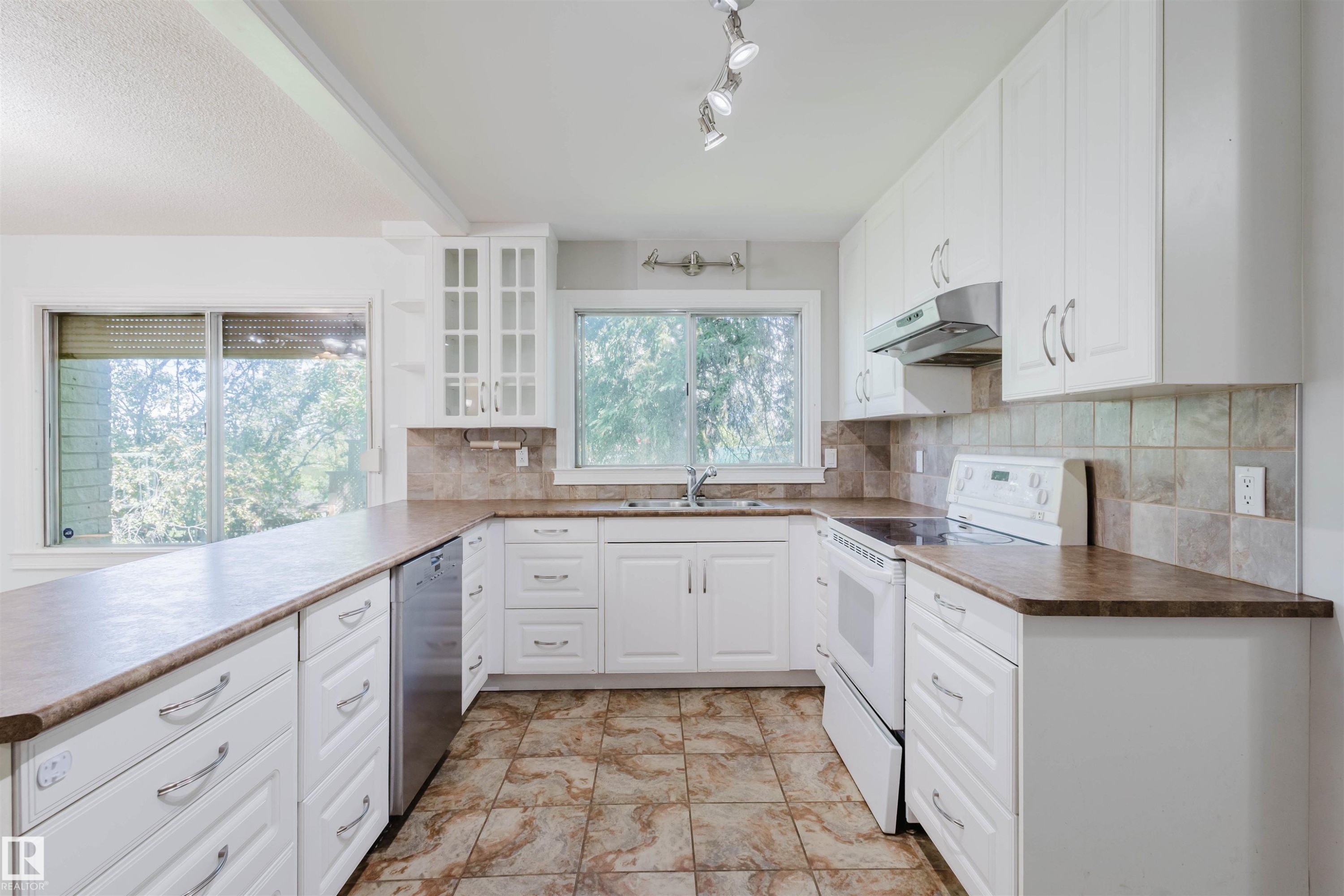 Edmonton, AB - Indoor Photo Showing Kitchen With Double Sink