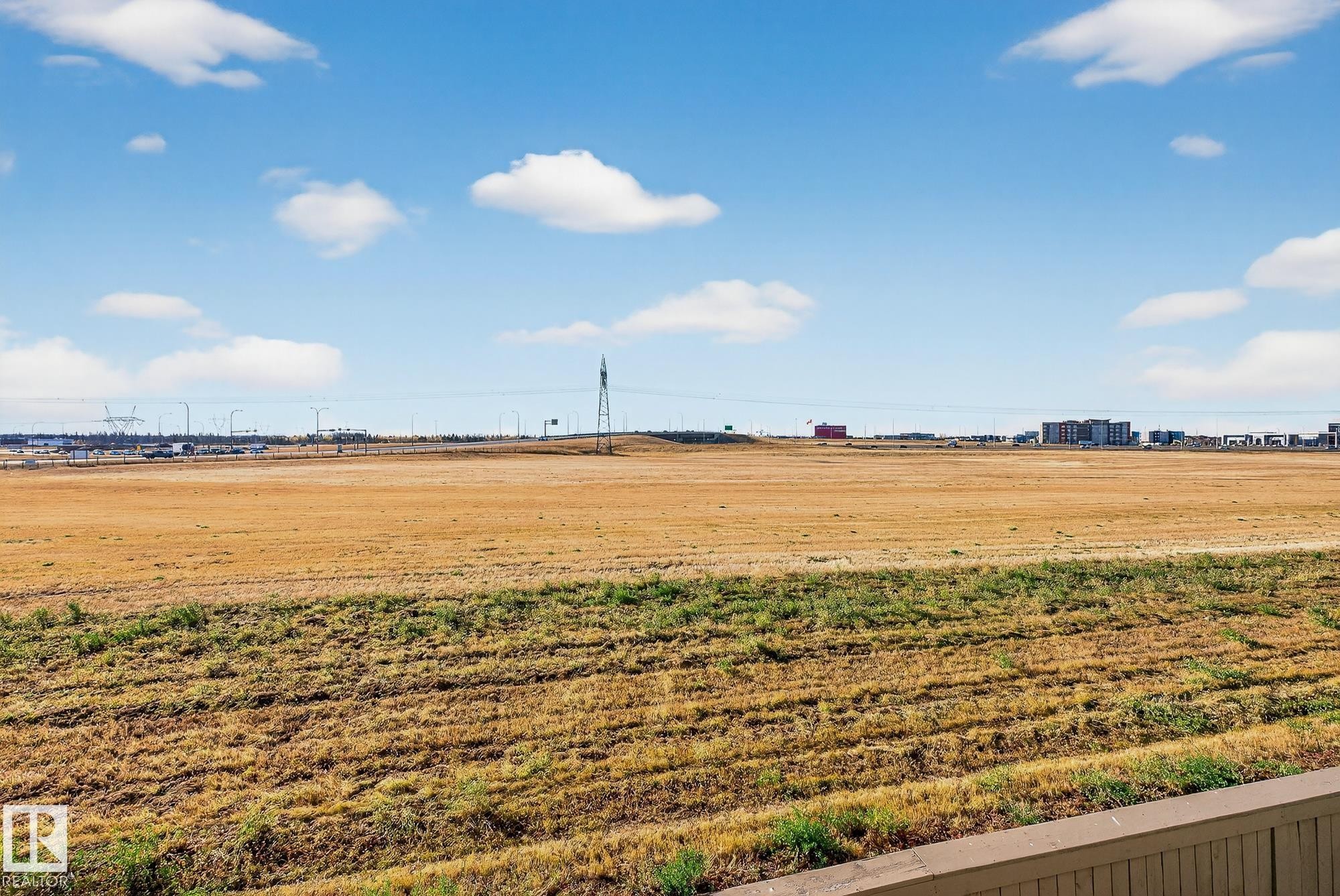 View of yard featuring a view of rural / pastoral area - 117 7293 South Terwillegar Drive, Edmonton, AB - Outdoor With View
