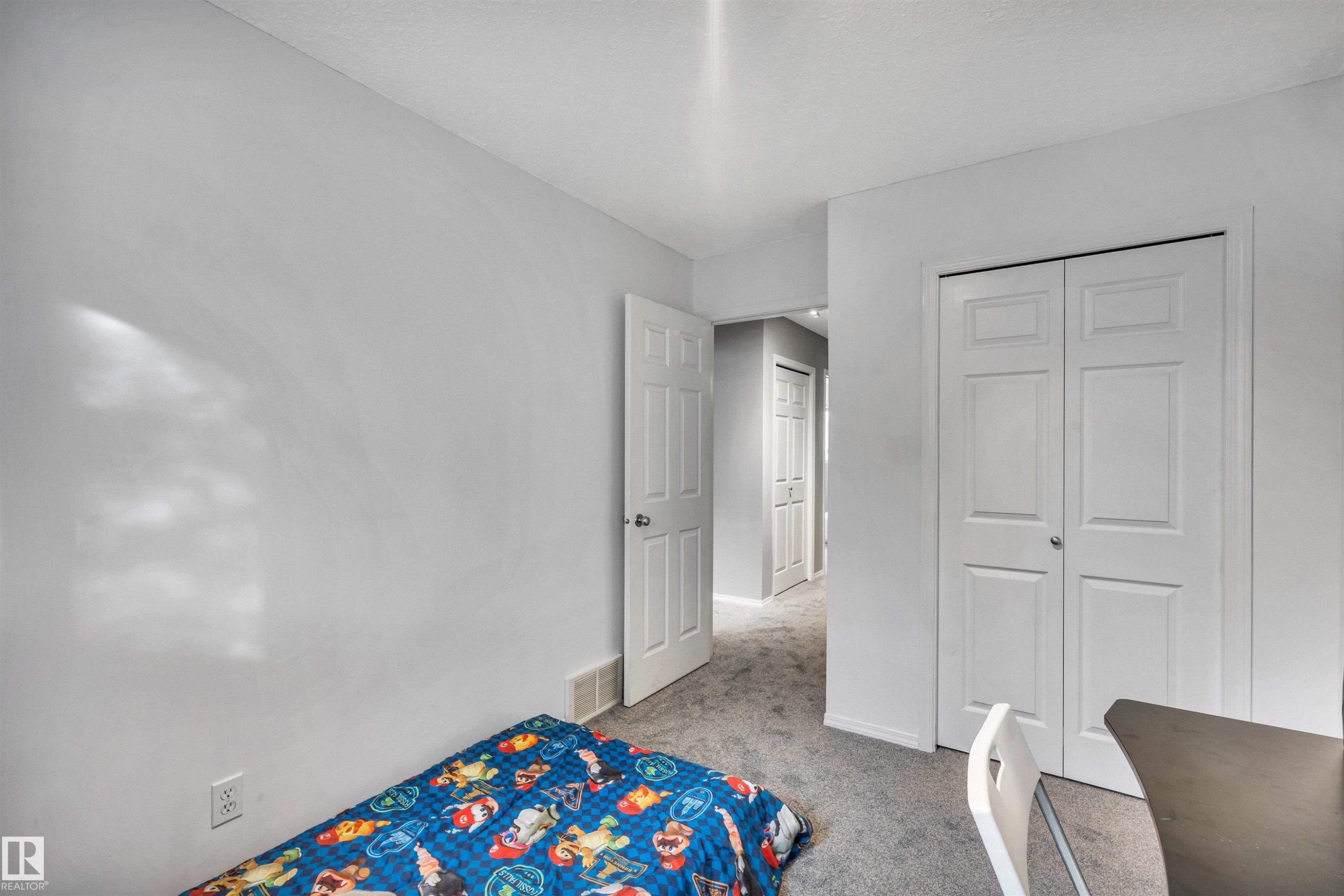 123 150 Edwards Drive, Edmonton, AB - Indoor Photo Showing Bedroom