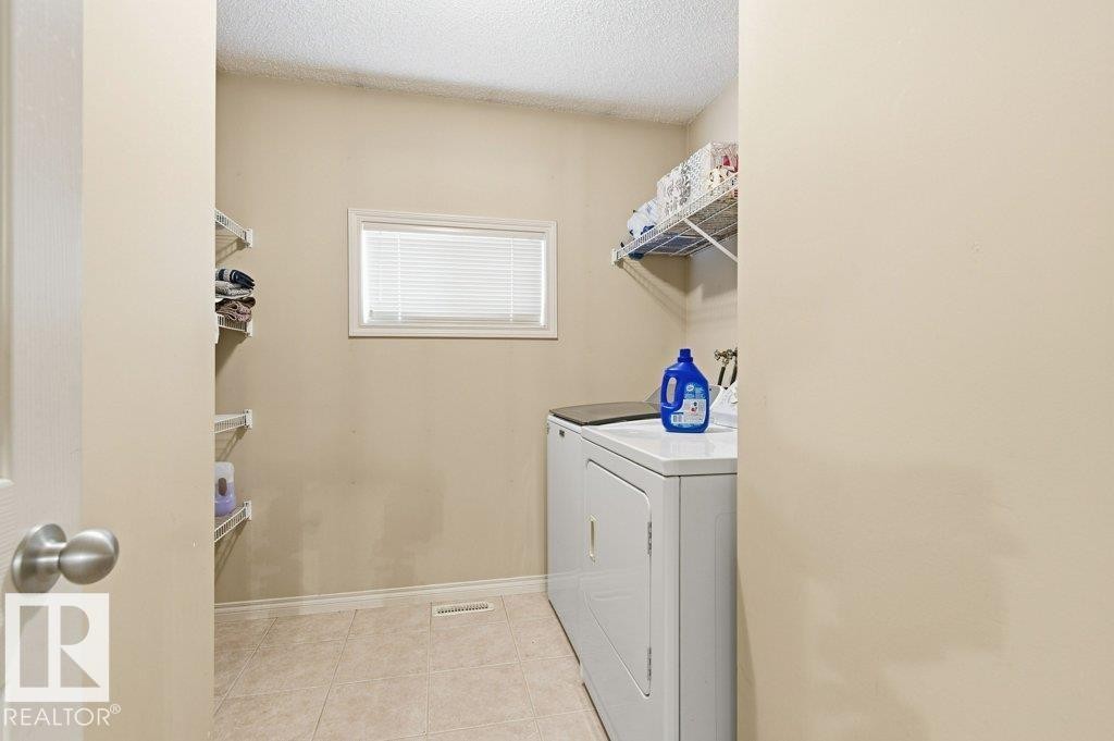 16228 48 Street, Edmonton, AB - Indoor Photo Showing Laundry Room