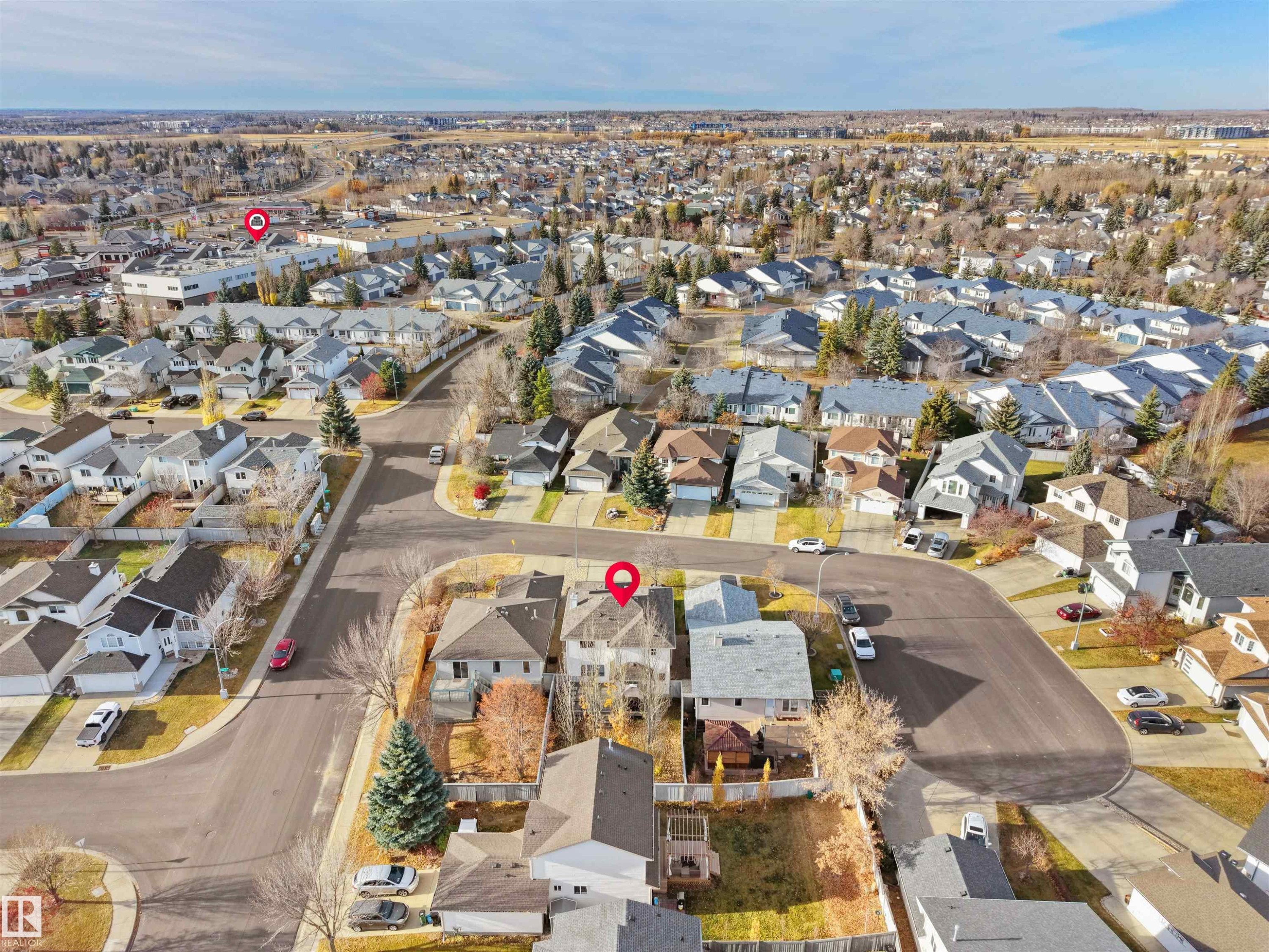 Aerial view of property and surrounding area featuring nearby suburban area - 94 Dechene Road, Edmonton, AB - Outdoor With View