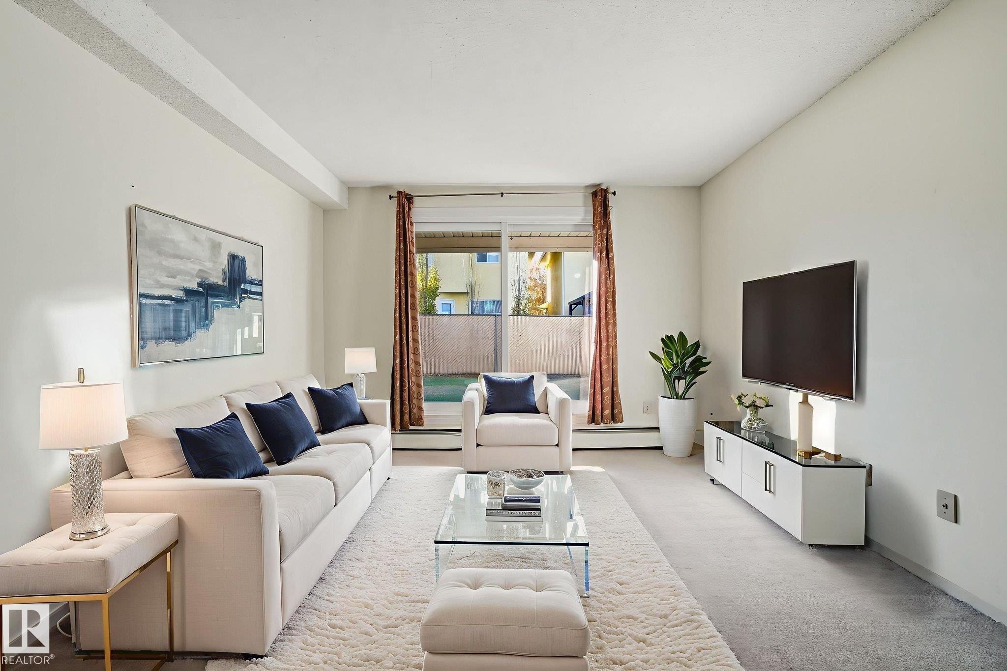 109 2624 Mill Woods Road E, Edmonton, AB - Indoor Photo Showing Living Room