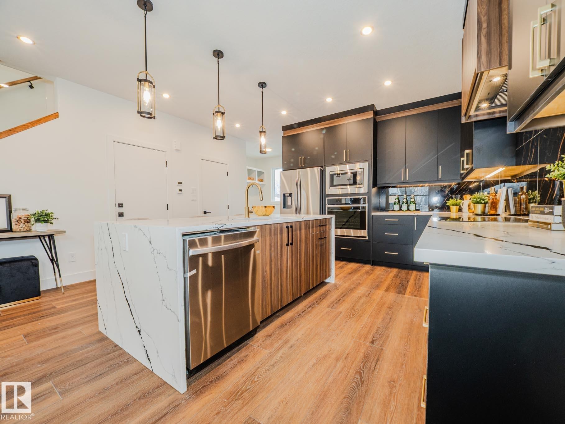 Edmonton, AB - Indoor Photo Showing Kitchen With Upgraded Kitchen