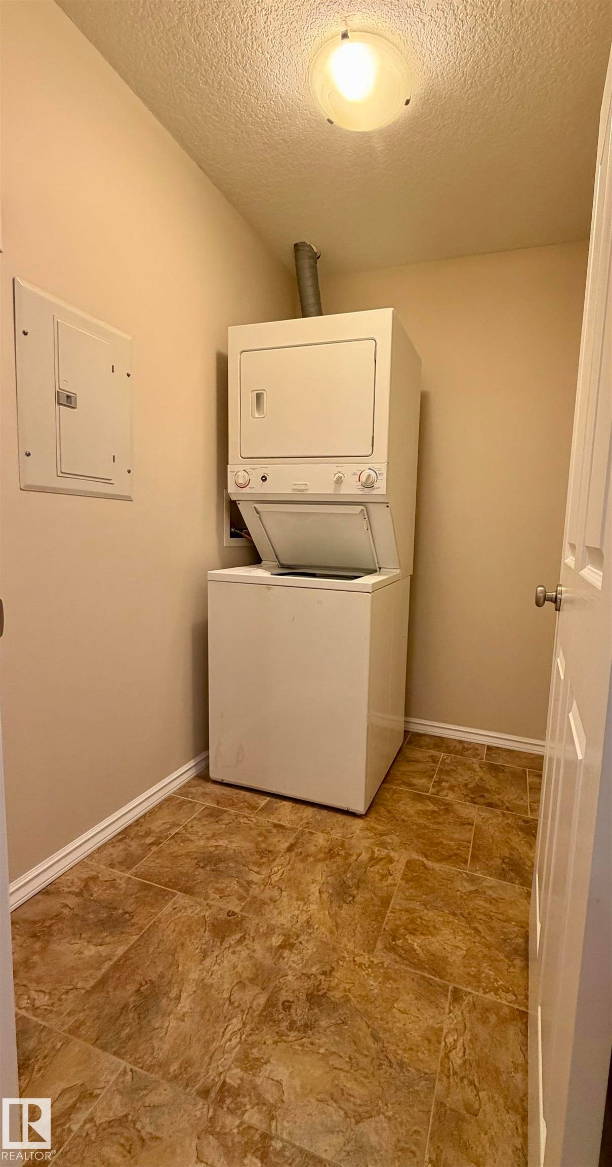 118 7801 Golf Course Road, Stony Plain, AB - Indoor Photo Showing Laundry Room