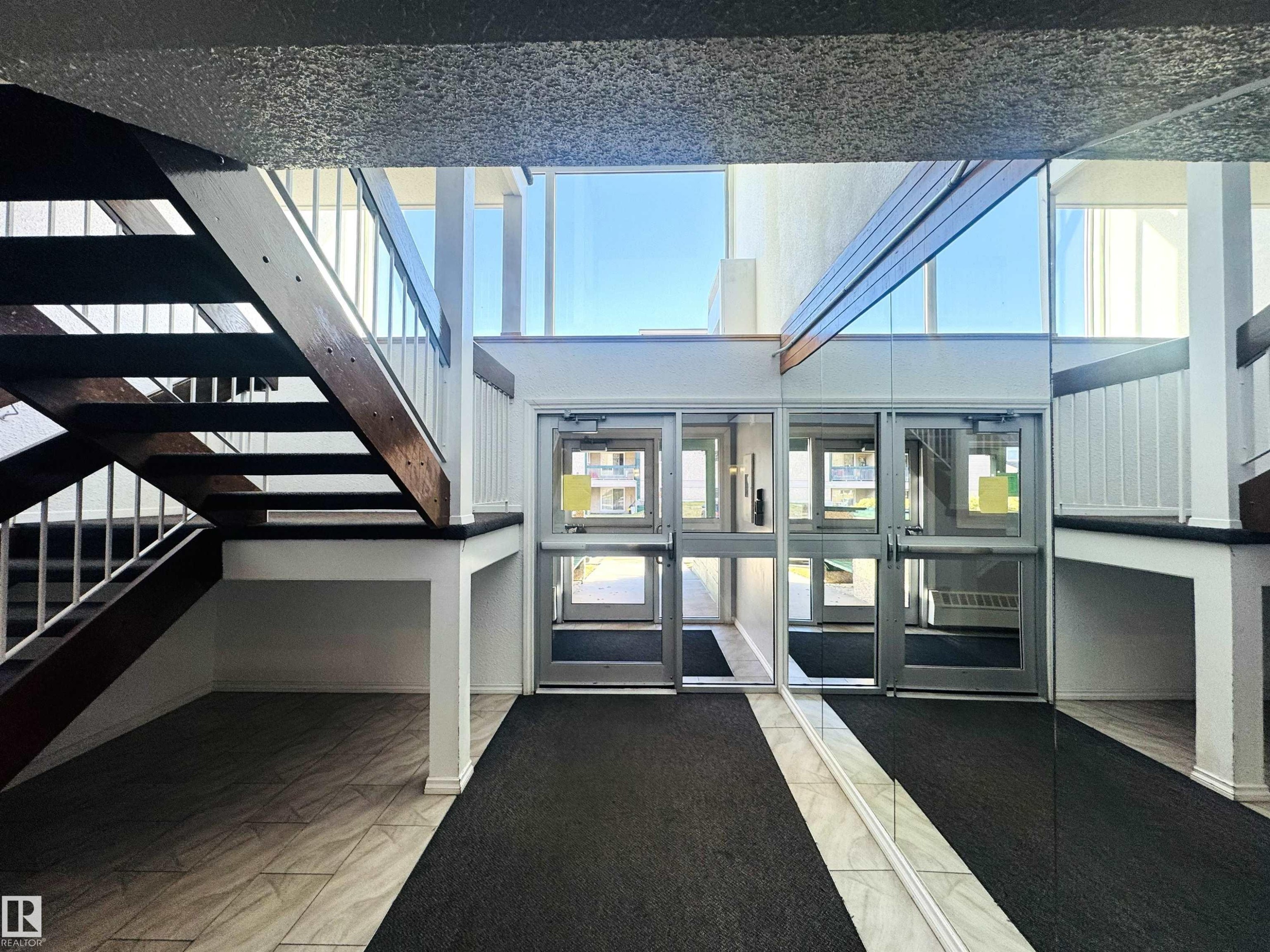 Common area featuring stairs - 309 1624 48 Street, Edmonton, AB - Indoor Photo Showing Other Room