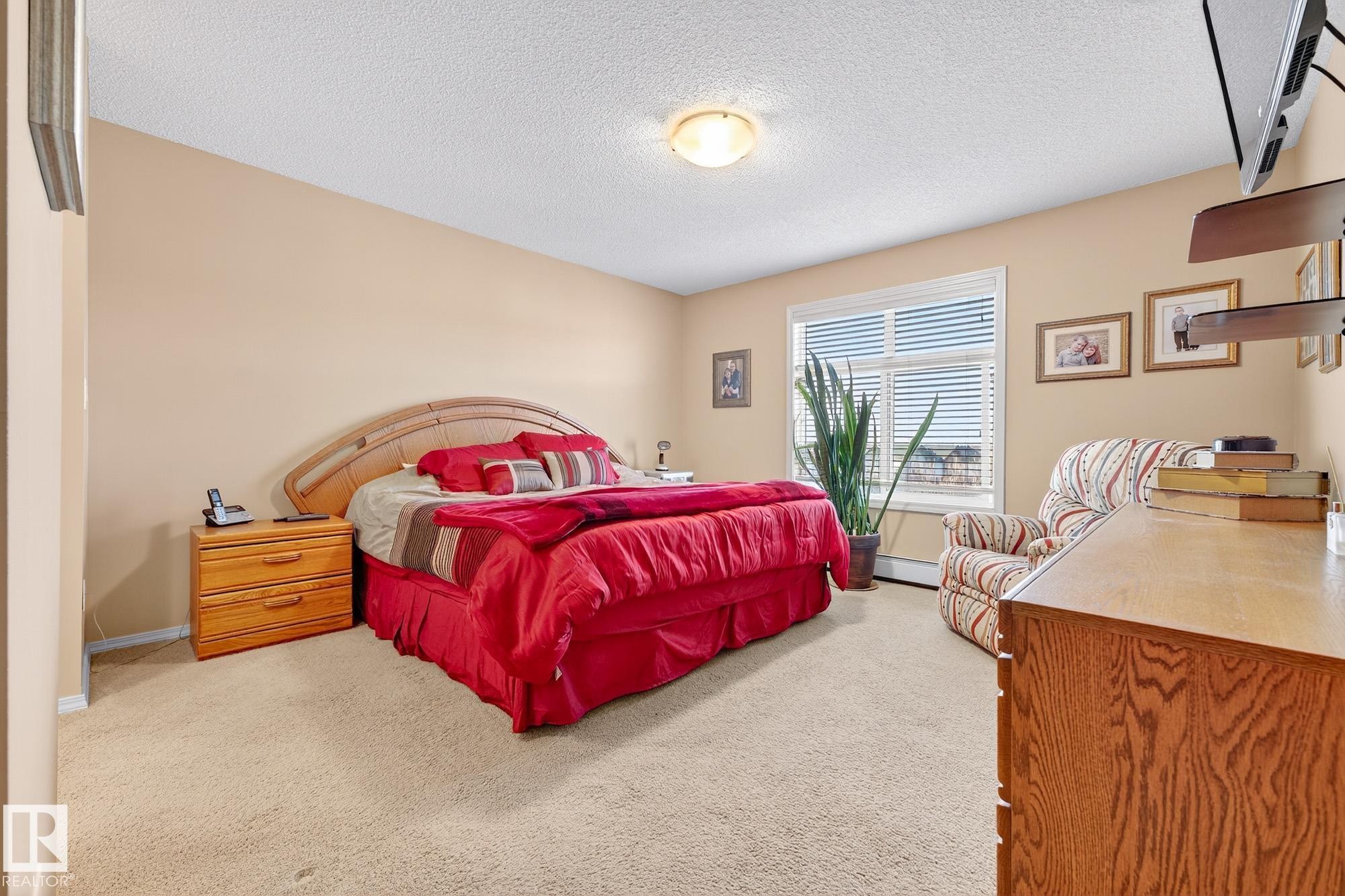 402 6070 Schonsee Way, Edmonton, AB - Indoor Photo Showing Bedroom
