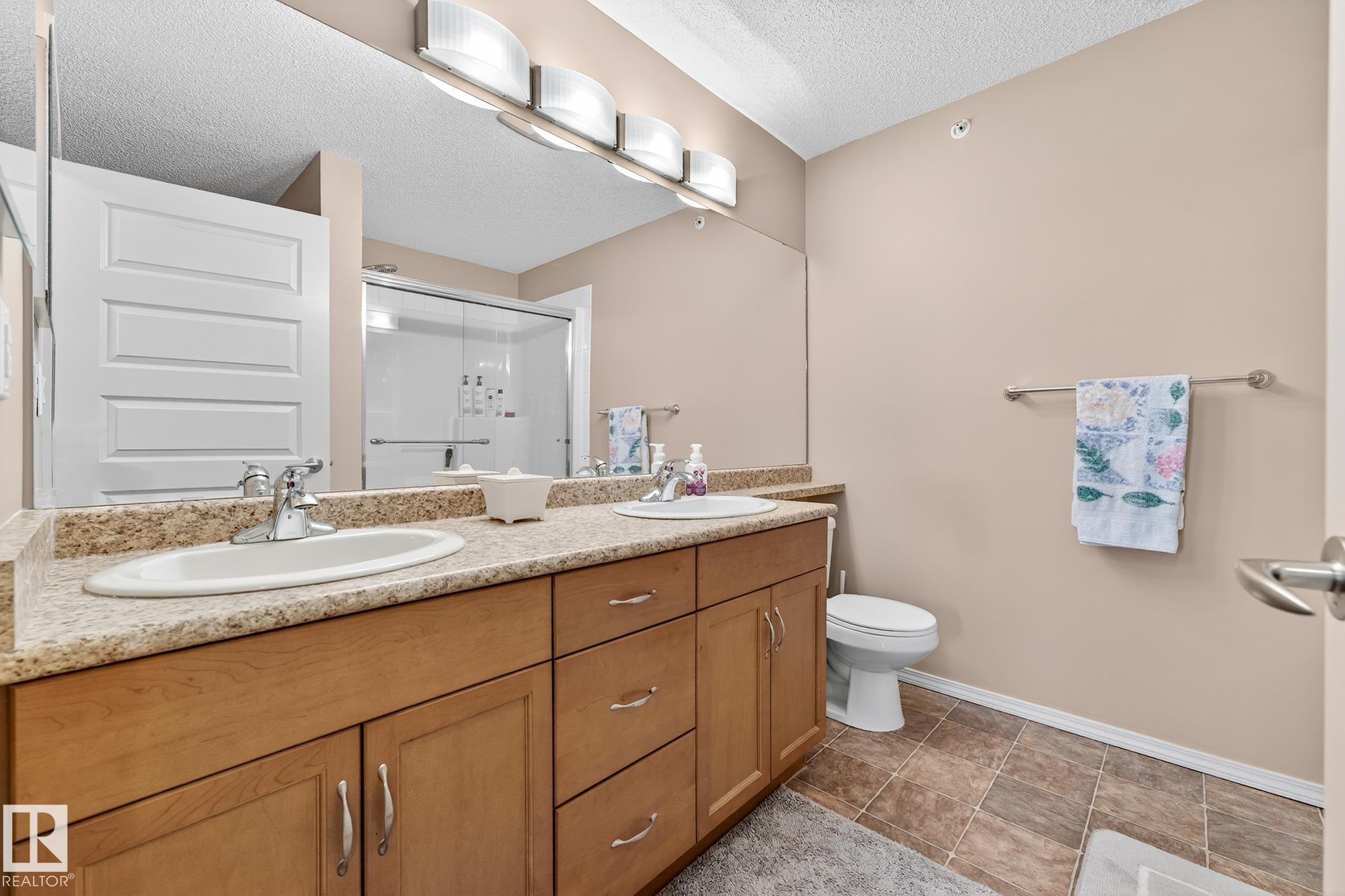402 6070 Schonsee Way, Edmonton, AB - Indoor Photo Showing Bathroom