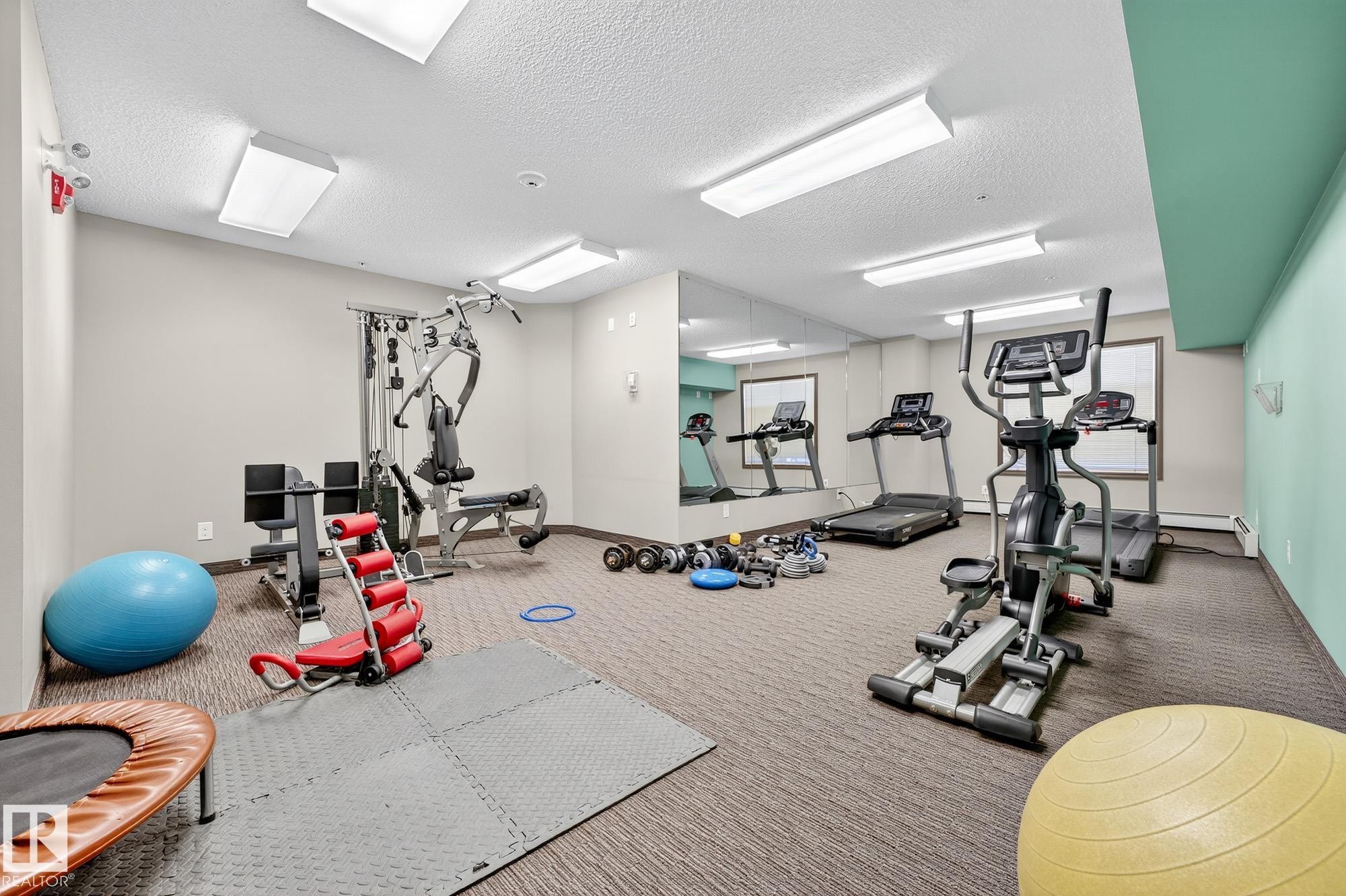 402 6070 Schonsee Way, Edmonton, AB - Indoor Photo Showing Gym Room