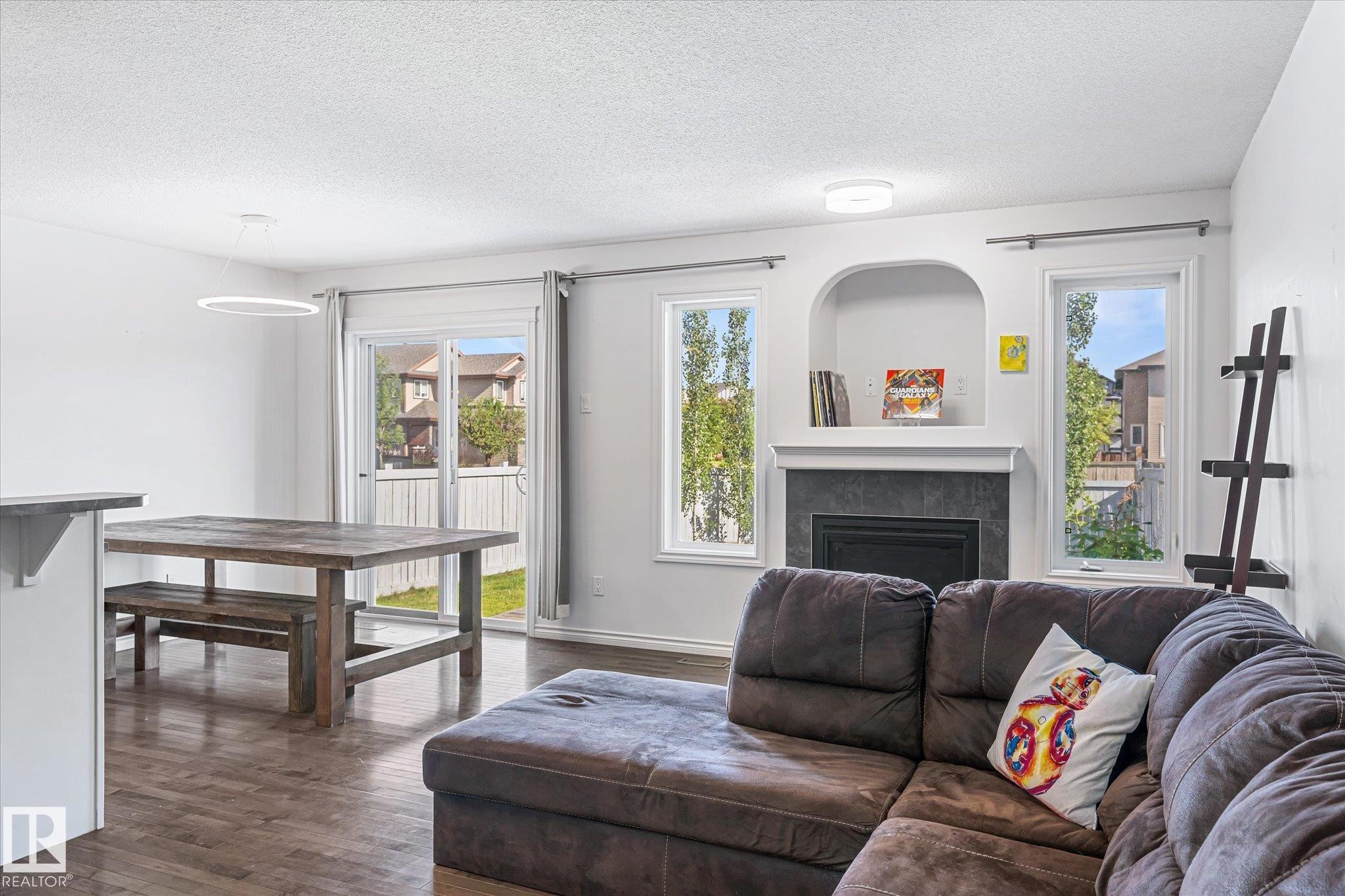 17130 7A Avenue, Edmonton, AB - Indoor Photo Showing Living Room With Fireplace