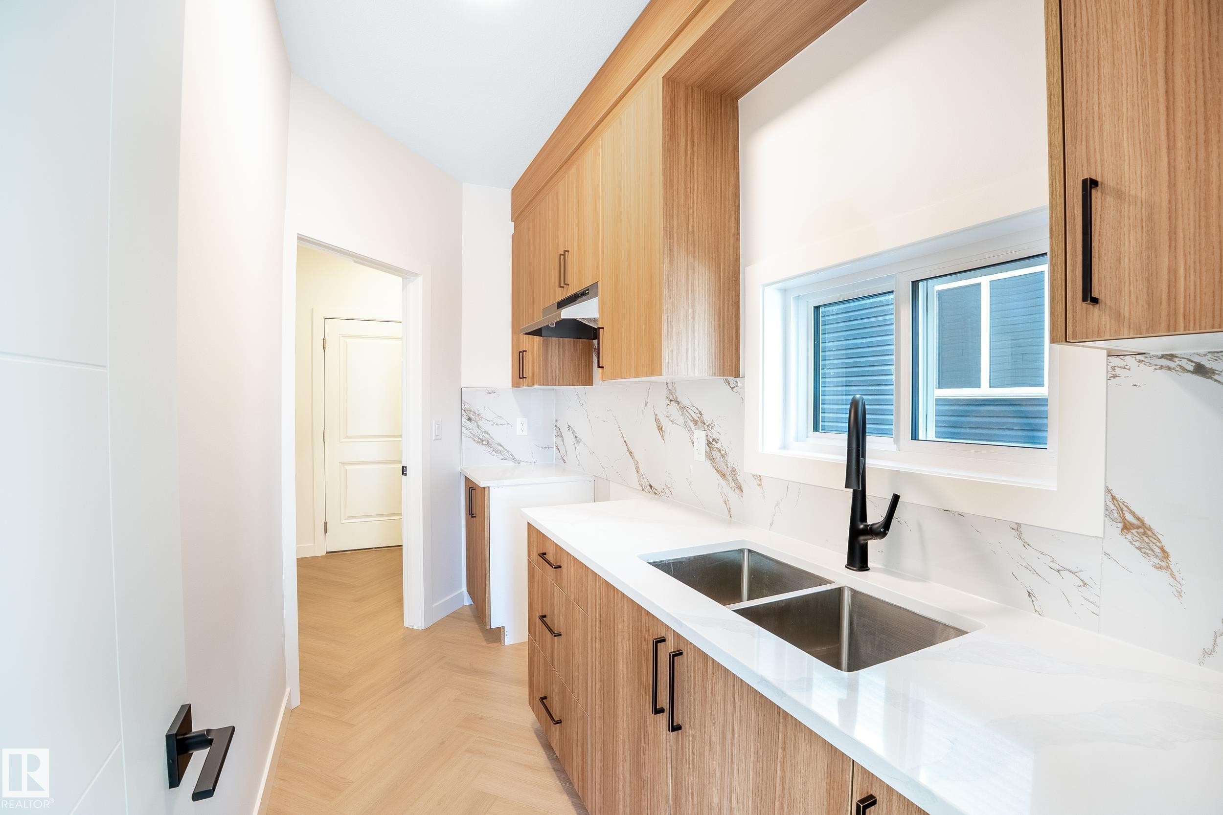 119 Lilac Close, Leduc, AB - Indoor Photo Showing Kitchen With Double Sink