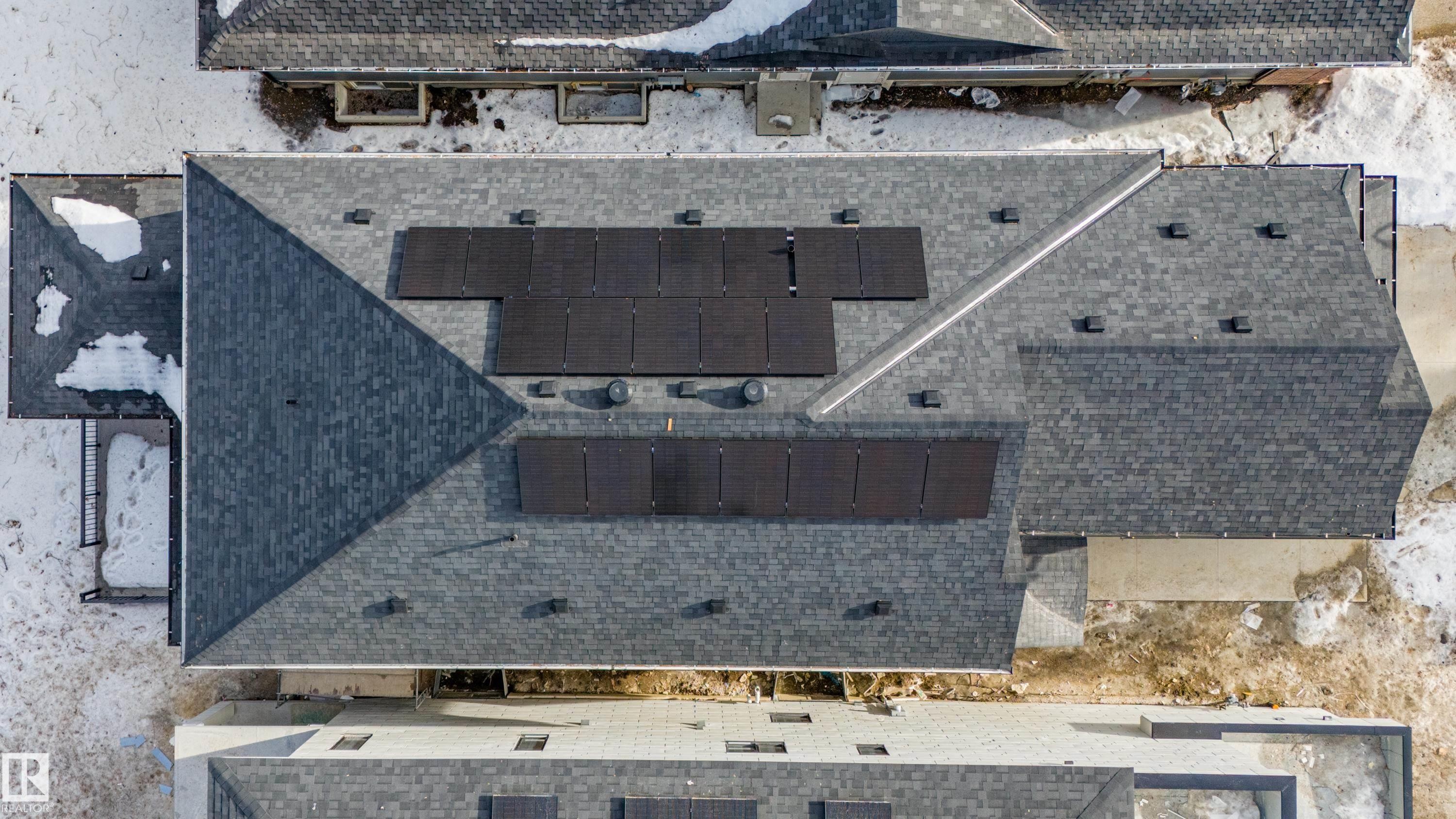 View of subject property featuring Solar Panels - 12304 39 Avenue, Edmonton, AB - Outdoor