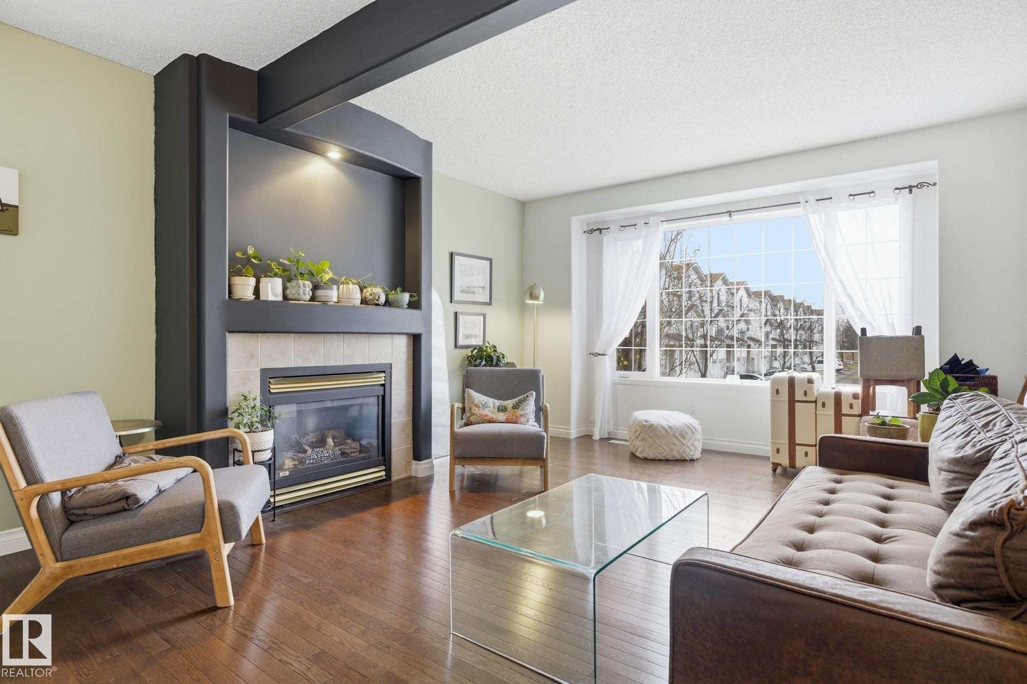 17 9935 167 Street, Edmonton, AB - Indoor Photo Showing Living Room With Fireplace