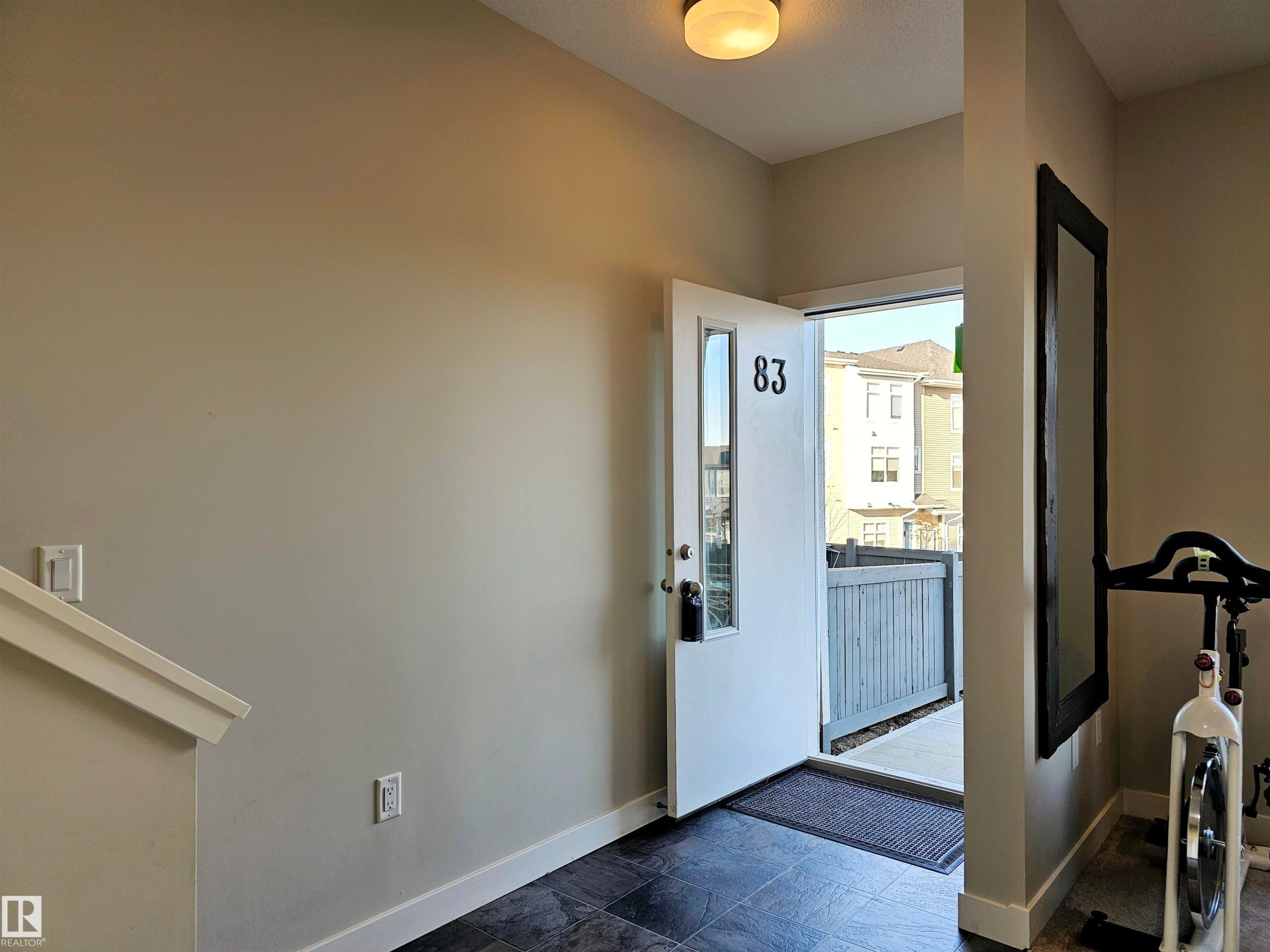 Entryway featuring baseboards - 83 600 Bellerose Drive, St. Albert, AB - Indoor Photo Showing Other Room