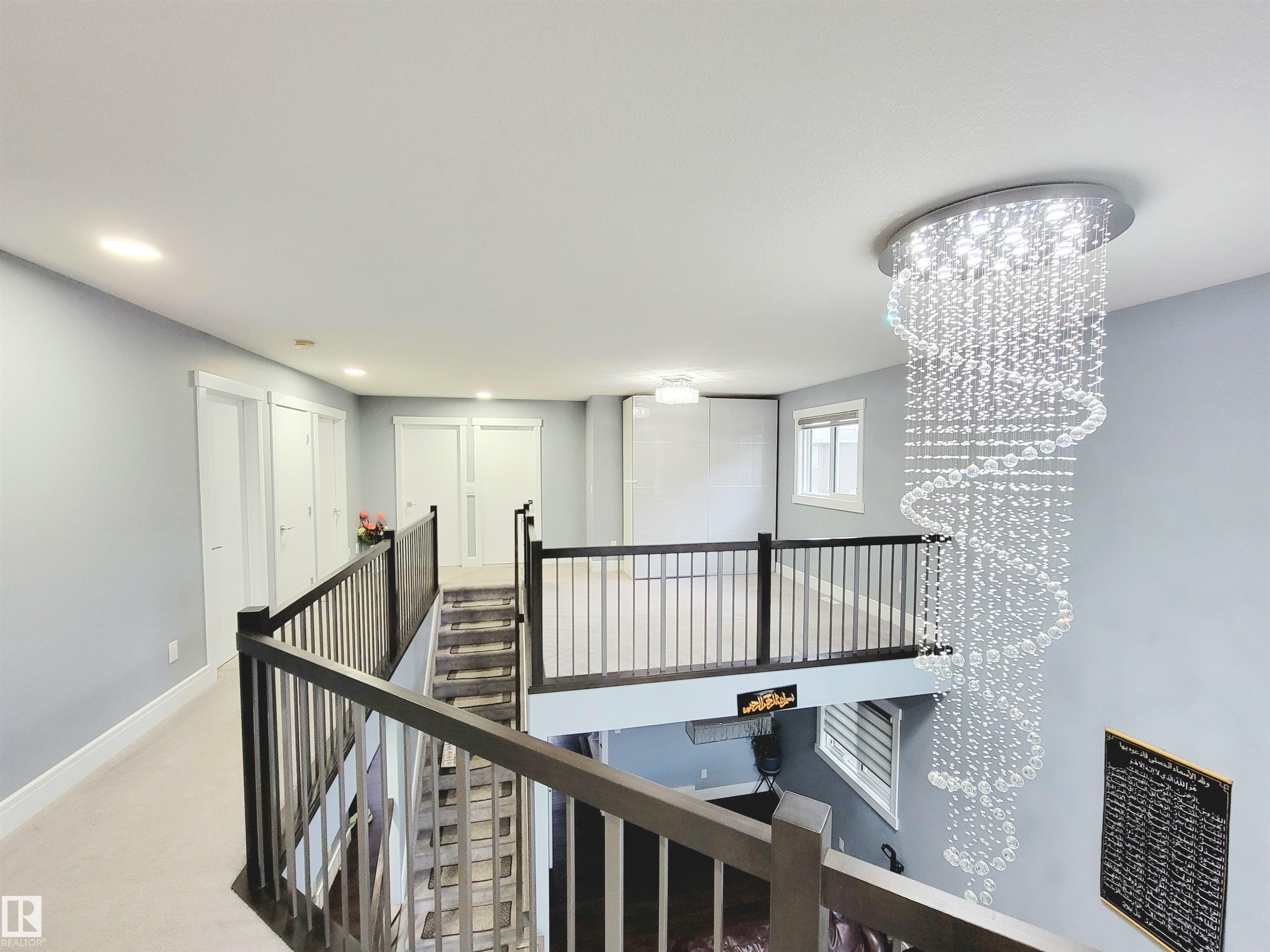 Hall with an upstairs landing, carpet, and recessed lighting - 1357 Watt Drive, Edmonton, AB - Indoor Photo Showing Other Room