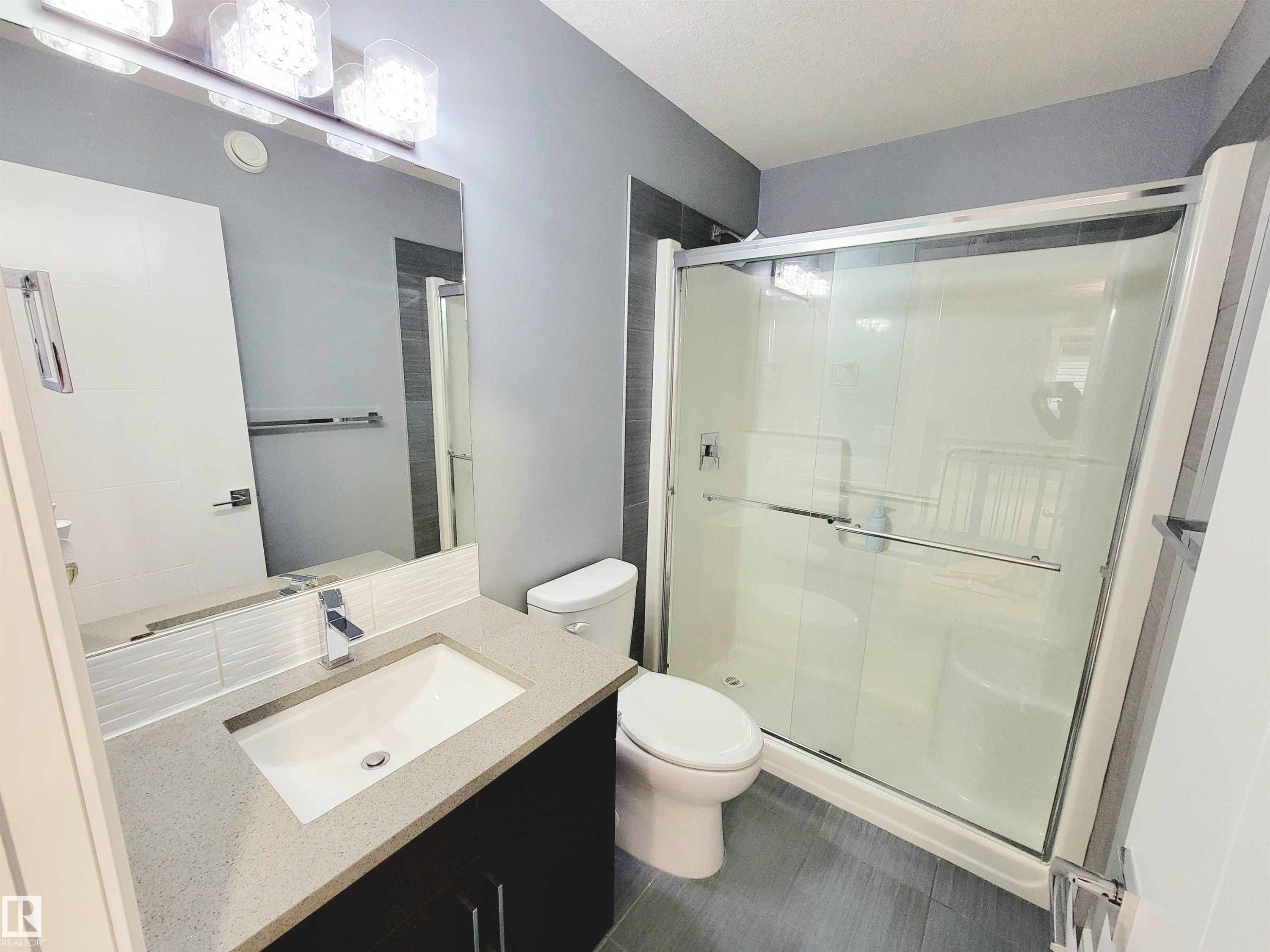 Bathroom with vanity and a shower stall - 1357 Watt Drive, Edmonton, AB - Indoor Photo Showing Bathroom