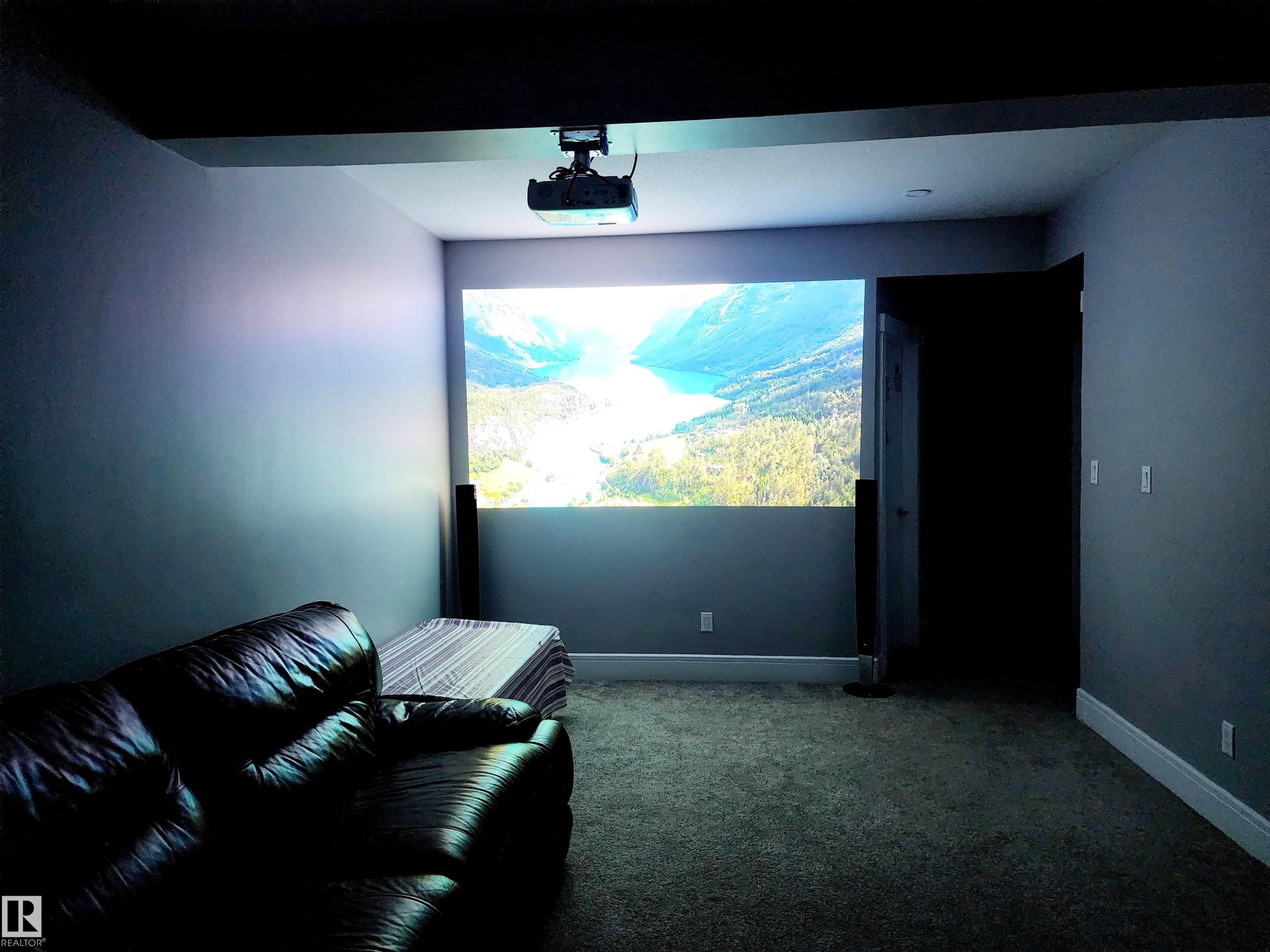 Carpeted home theater with baseboards - 1357 Watt Drive, Edmonton, AB - Indoor