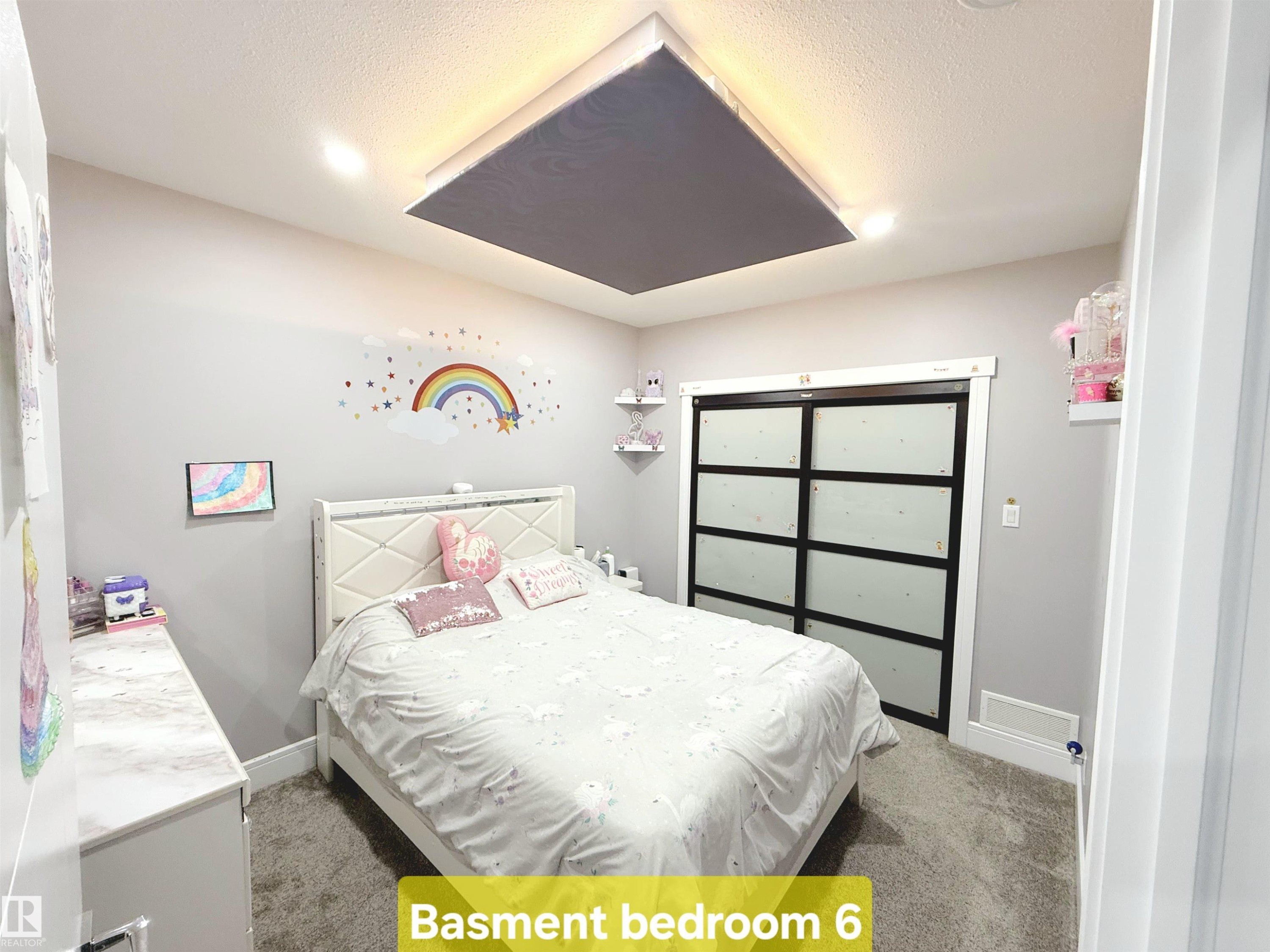 Bedroom with light carpet and baseboards - 1357 Watt Drive, Edmonton, AB - Indoor Photo Showing Bedroom
