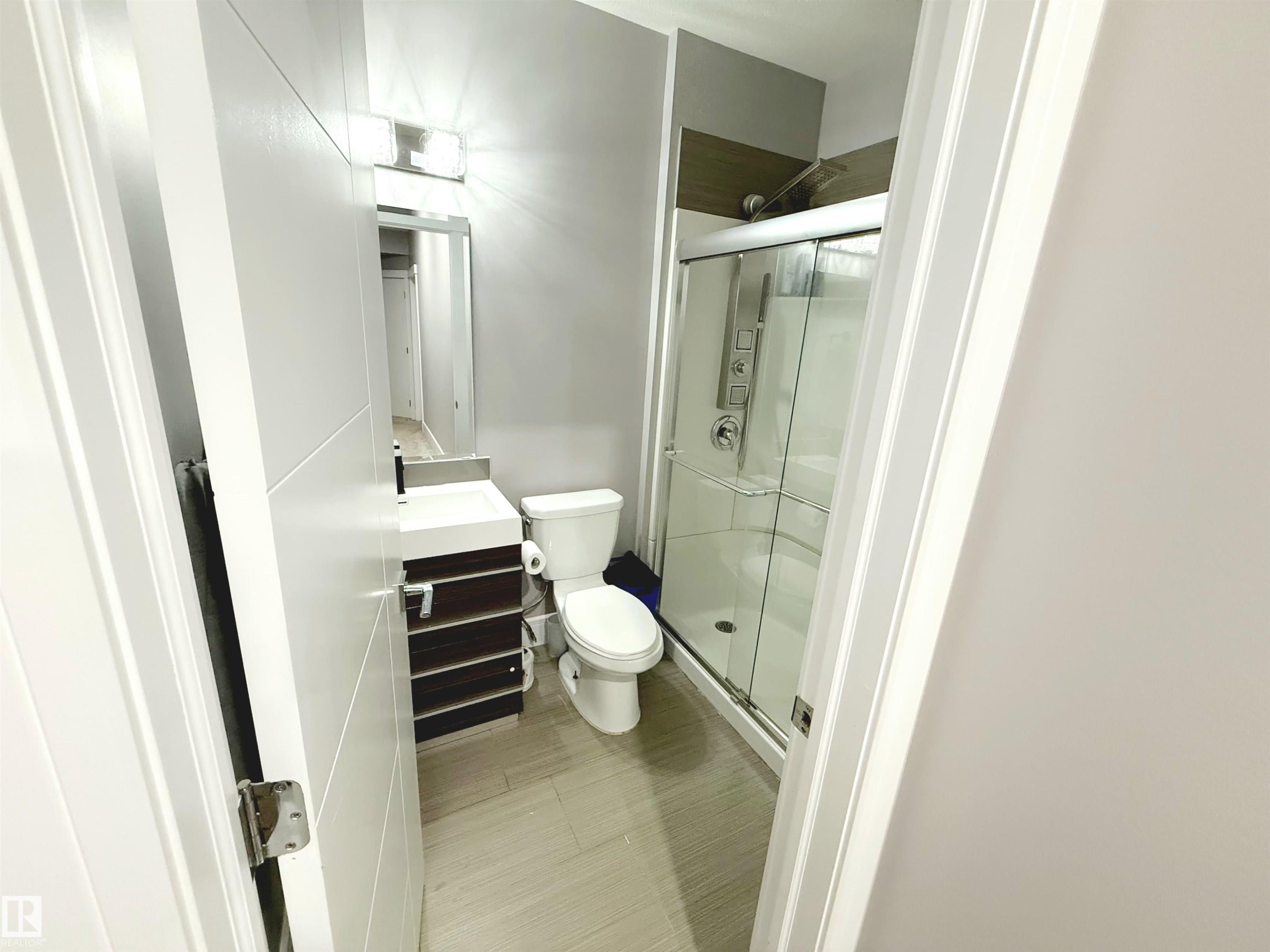 Bathroom with vanity and a stall shower - 1357 Watt Drive, Edmonton, AB - Indoor Photo Showing Bathroom