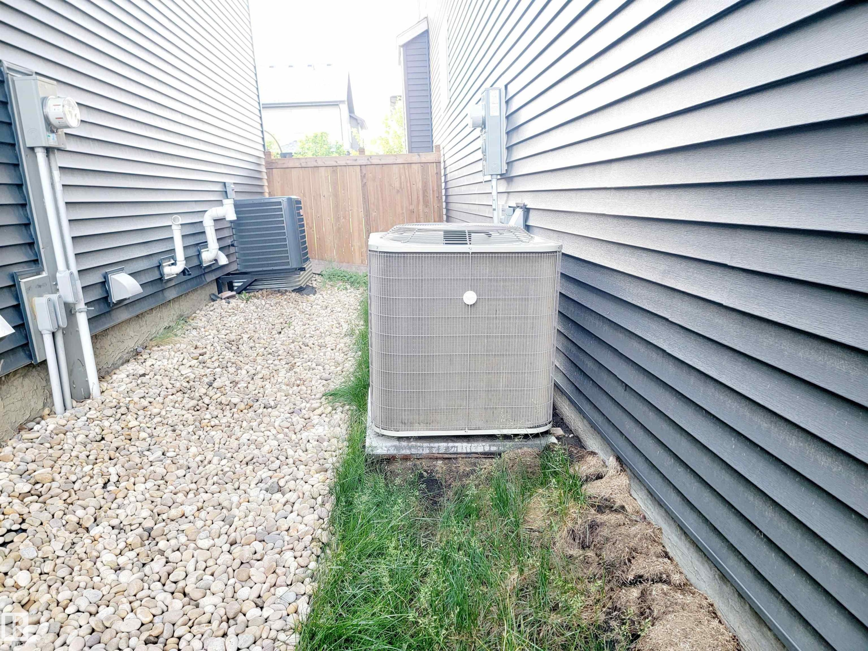 Exterior view of a central AC unit - 1357 Watt Drive, Edmonton, AB - Outdoor With Exterior