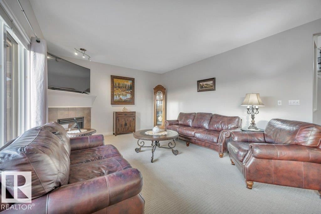 827 Southfork Green, Leduc, AB - Indoor Photo Showing Living Room With Fireplace
