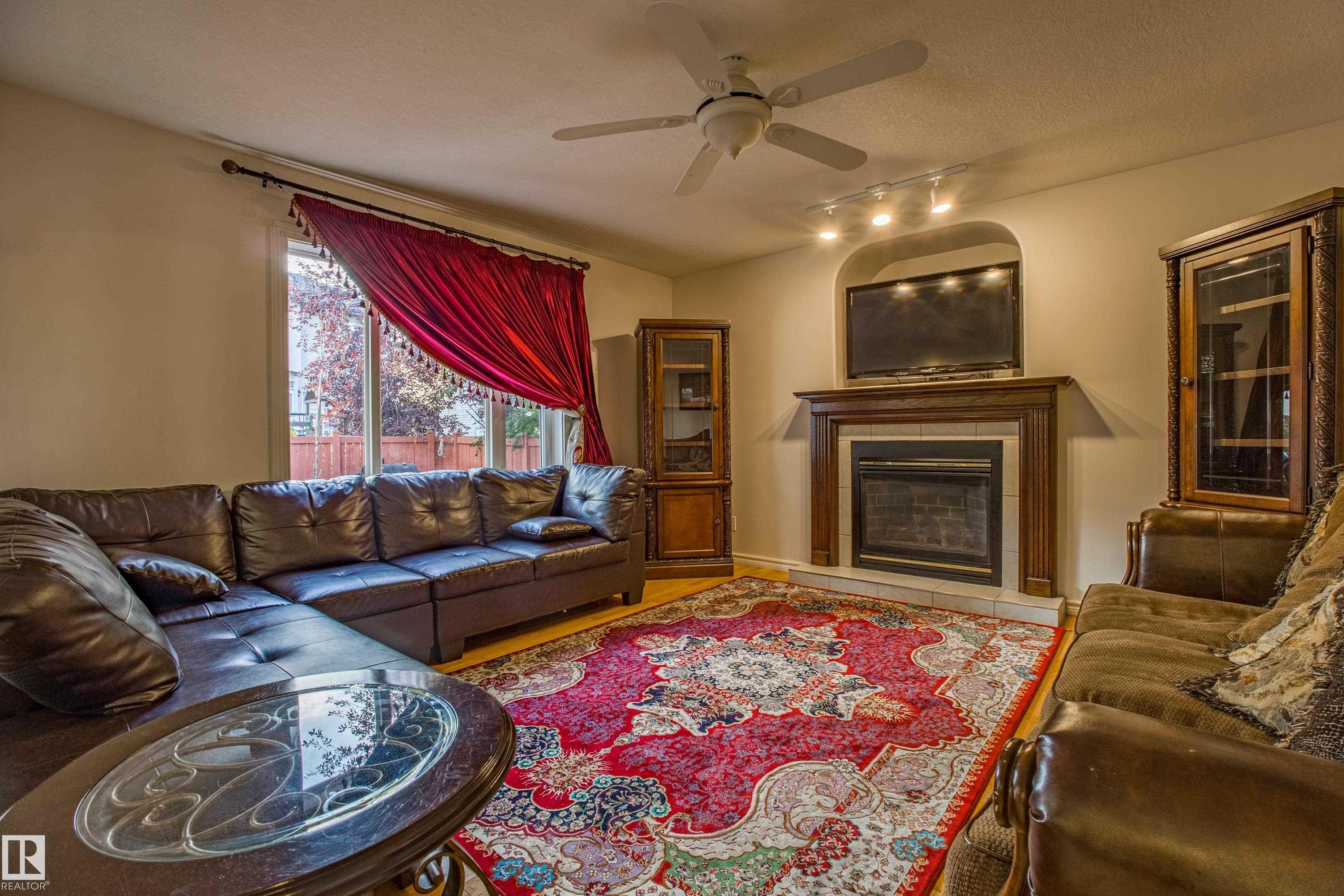 247 Lindsay Crescent, Edmonton, AB - Indoor Photo Showing Living Room With Fireplace