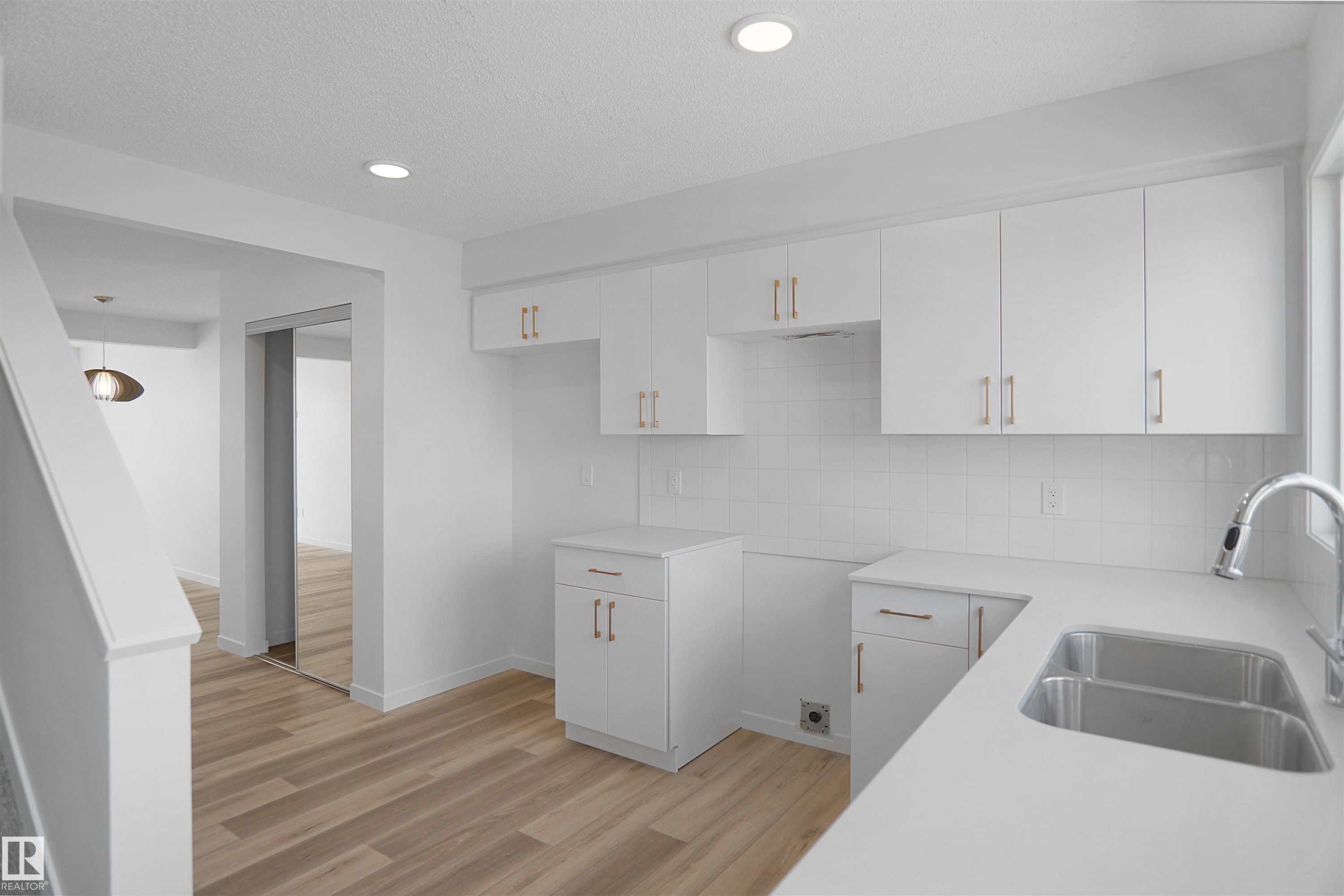 100 3705 141 Street, Edmonton, AB - Indoor Photo Showing Kitchen With Double Sink