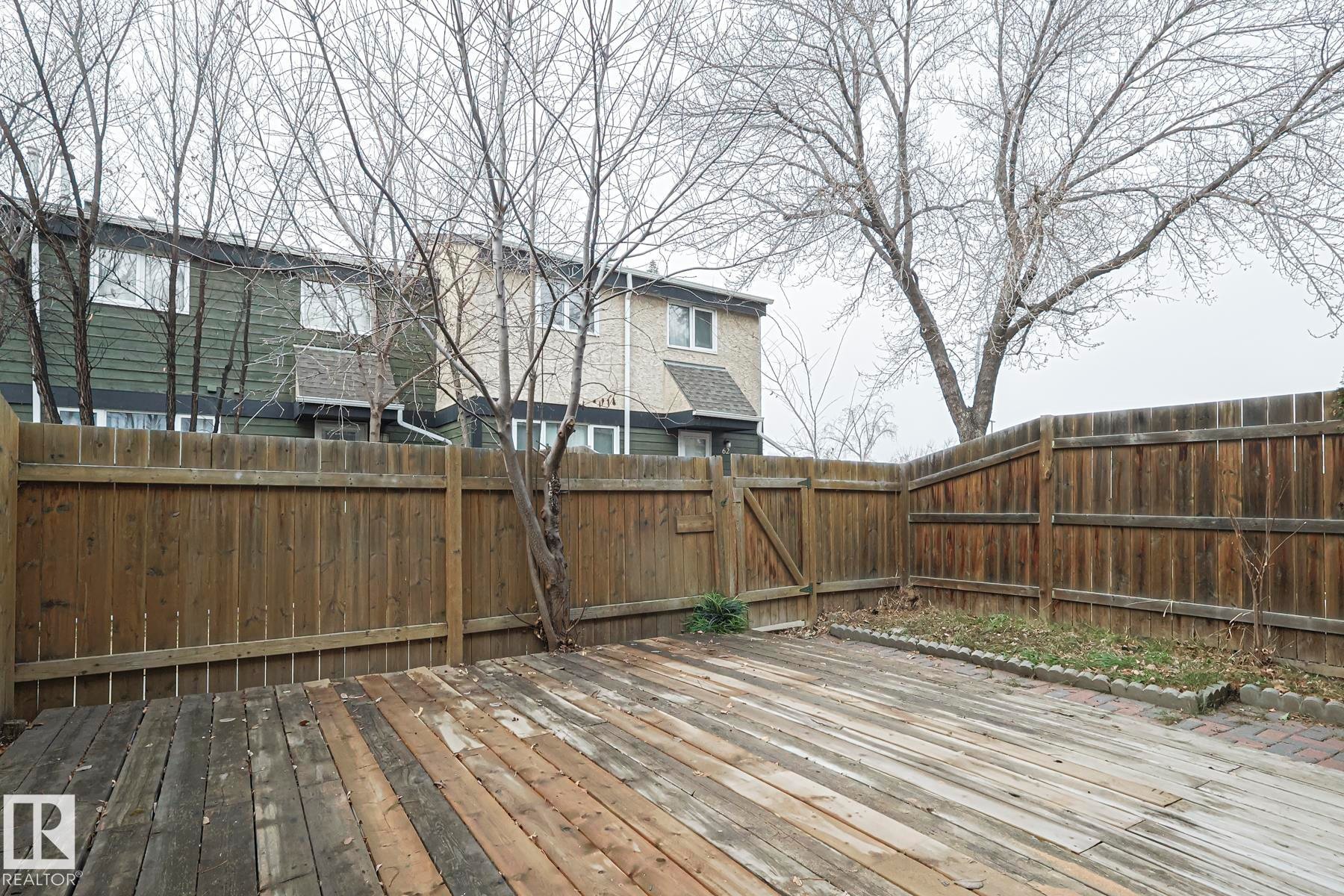 Wooden deck featuring a fenced backyard - 51 Belmead Gardens, Edmonton, AB - Outdoor