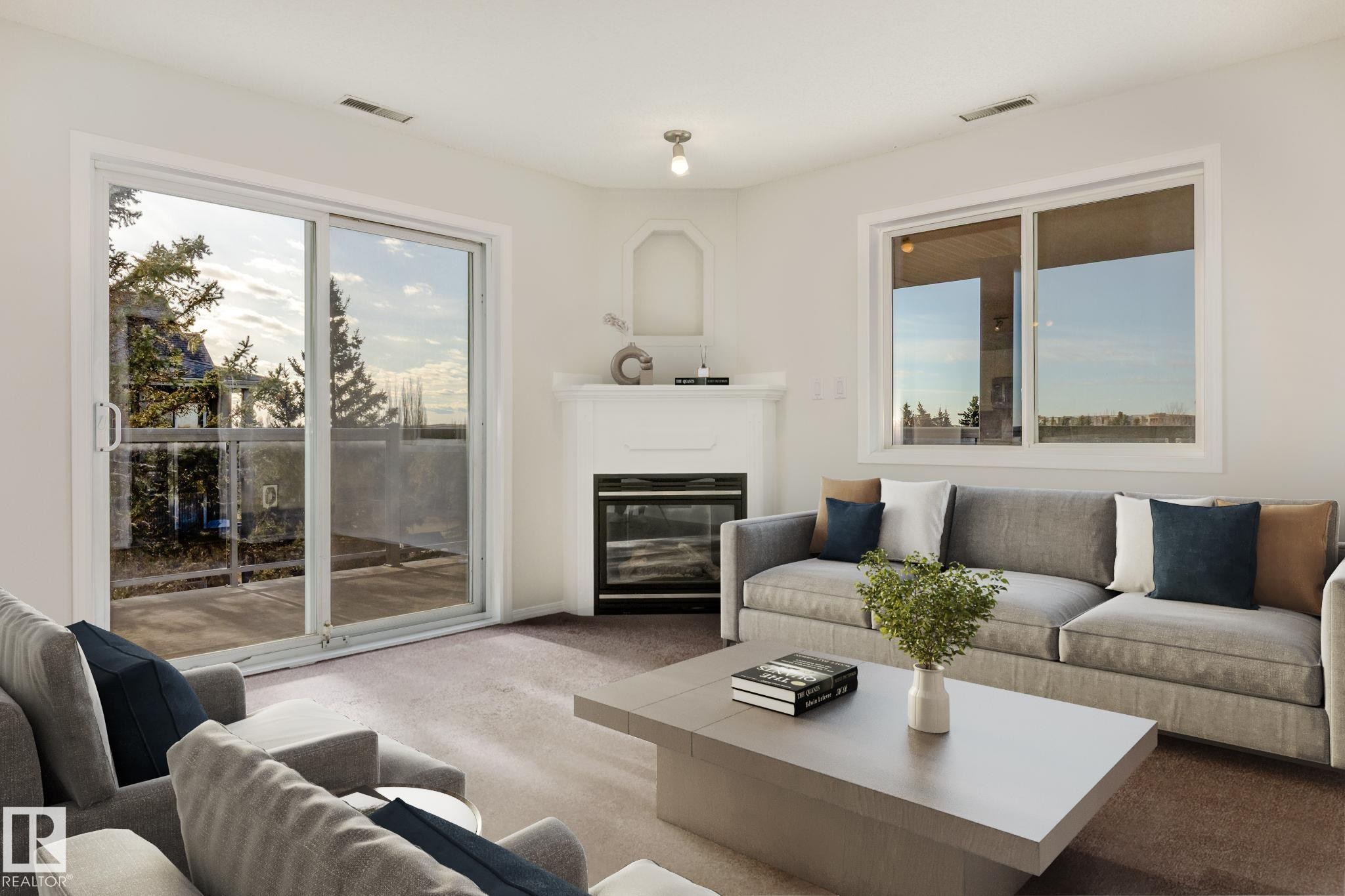 443 279 Suder Greens Drive, Edmonton, AB - Indoor Photo Showing Living Room With Fireplace