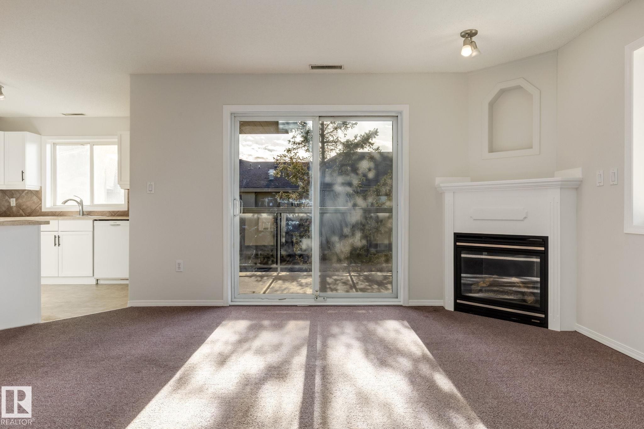 443 279 Suder Greens Drive, Edmonton, AB - Indoor With Fireplace
