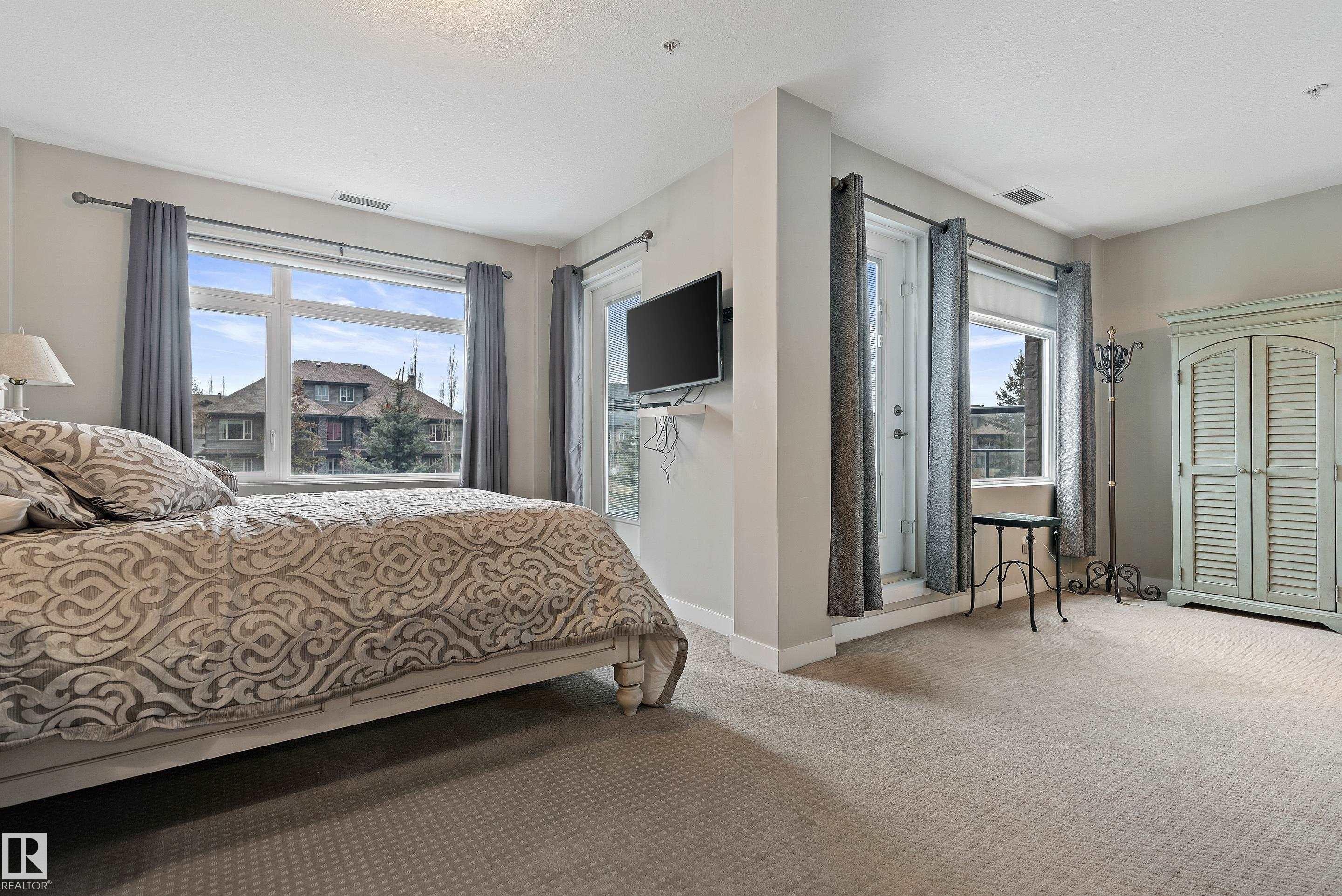 101 5151 Windermere Boulevard, Edmonton, AB - Indoor Photo Showing Bedroom