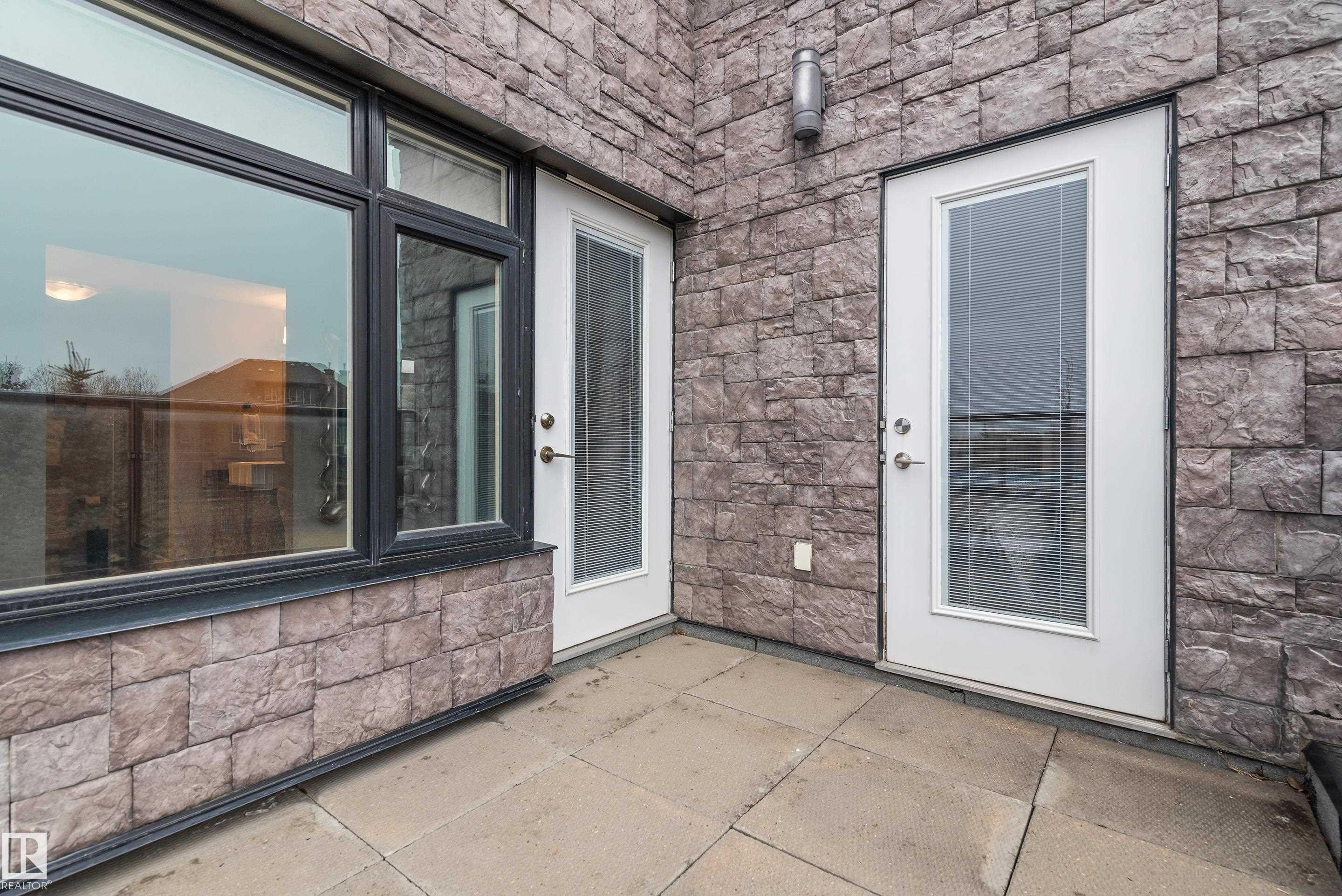 101 5151 Windermere Boulevard, Edmonton, AB - Outdoor With Balcony With Exterior