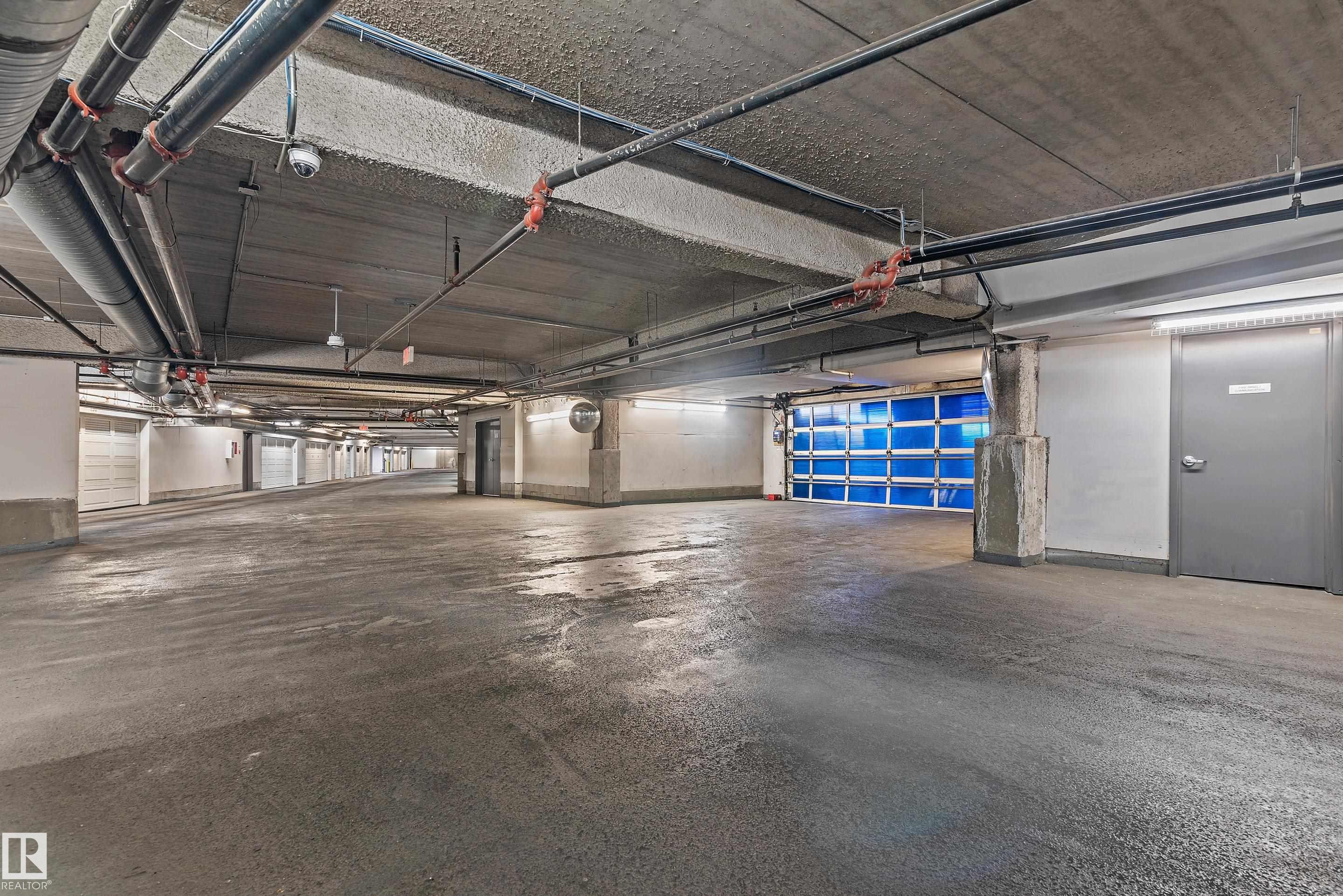 101 5151 Windermere Boulevard, Edmonton, AB - Indoor Photo Showing Garage