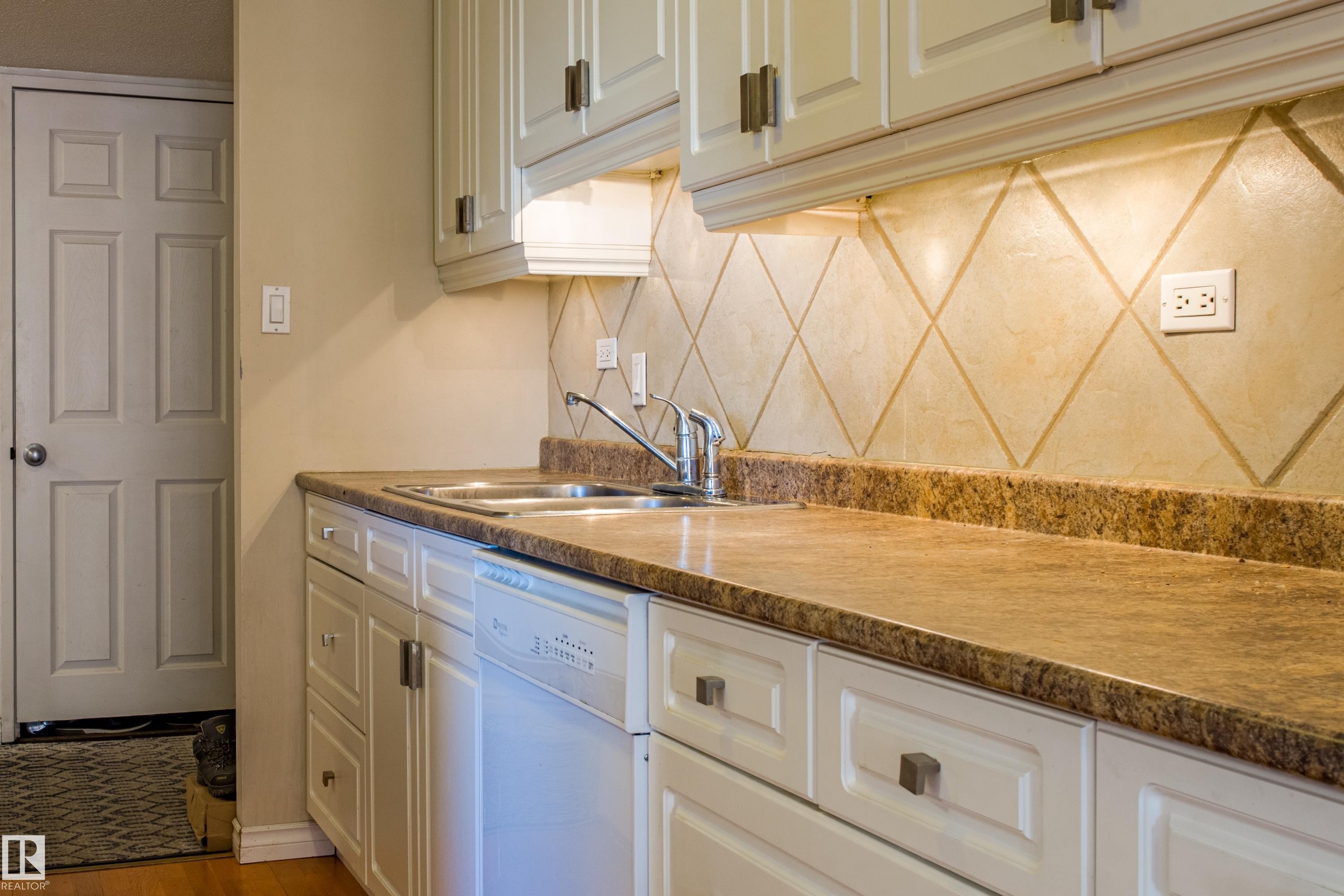 1703 12303 Jasper Avenue, Edmonton, AB - Indoor Photo Showing Kitchen With Double Sink