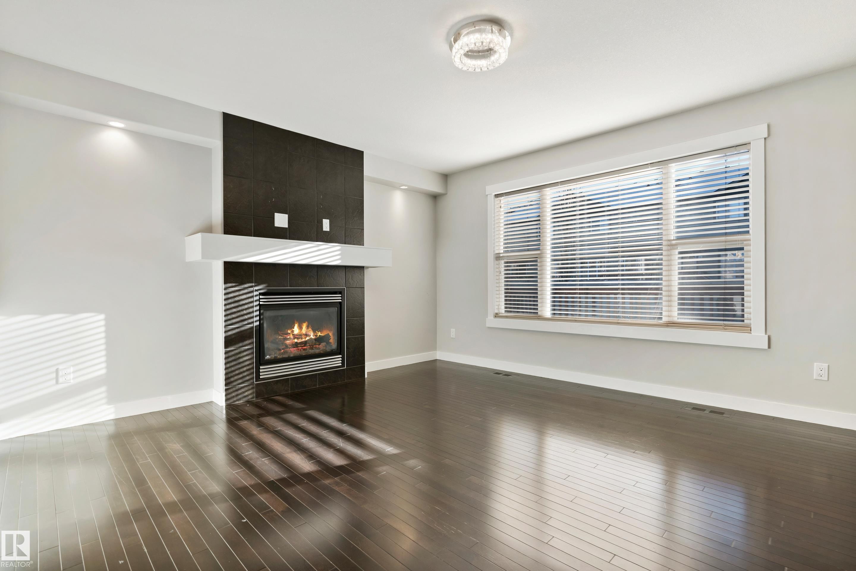 6963 19A Avenue, Edmonton, AB - Indoor Photo Showing Living Room With Fireplace