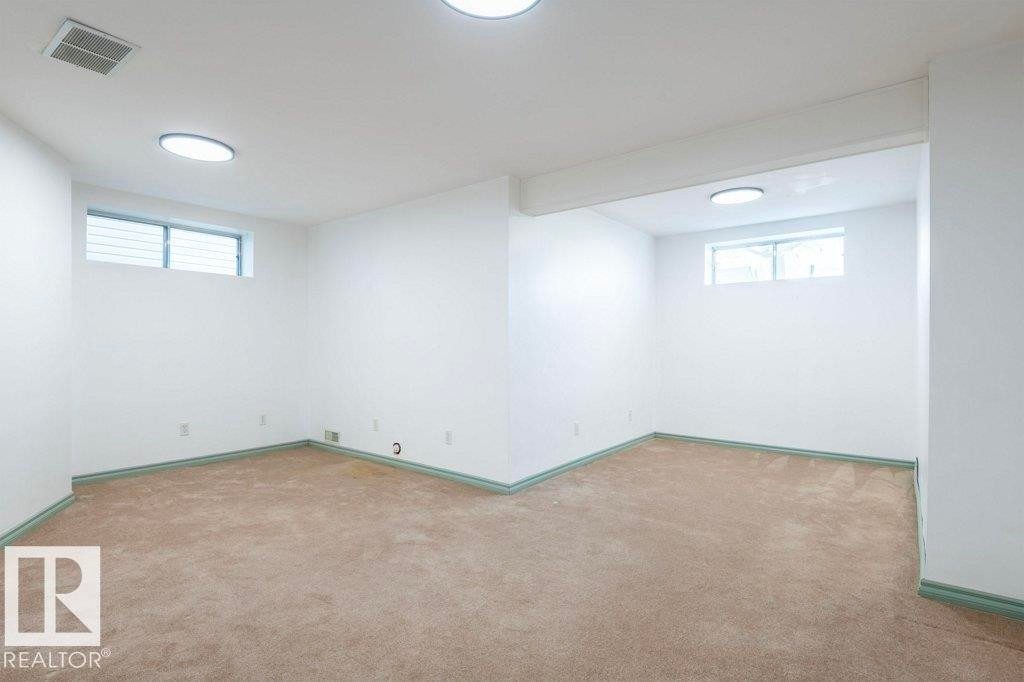 Basement with carpet flooring - 1112 118A Street Nw, Edmonton, AB - Indoor Photo Showing Other Room