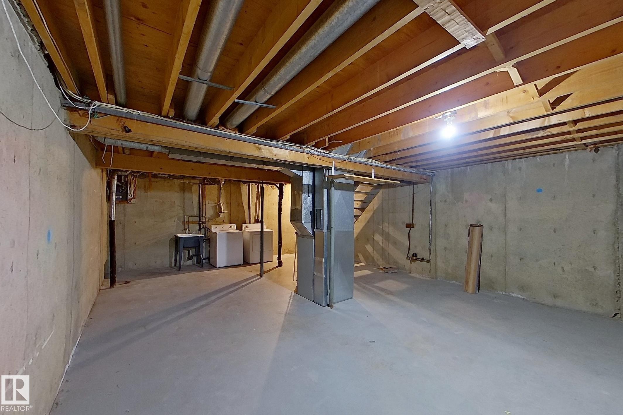 112 Dickinsfield Court Nw, Edmonton, AB - Indoor Photo Showing Basement