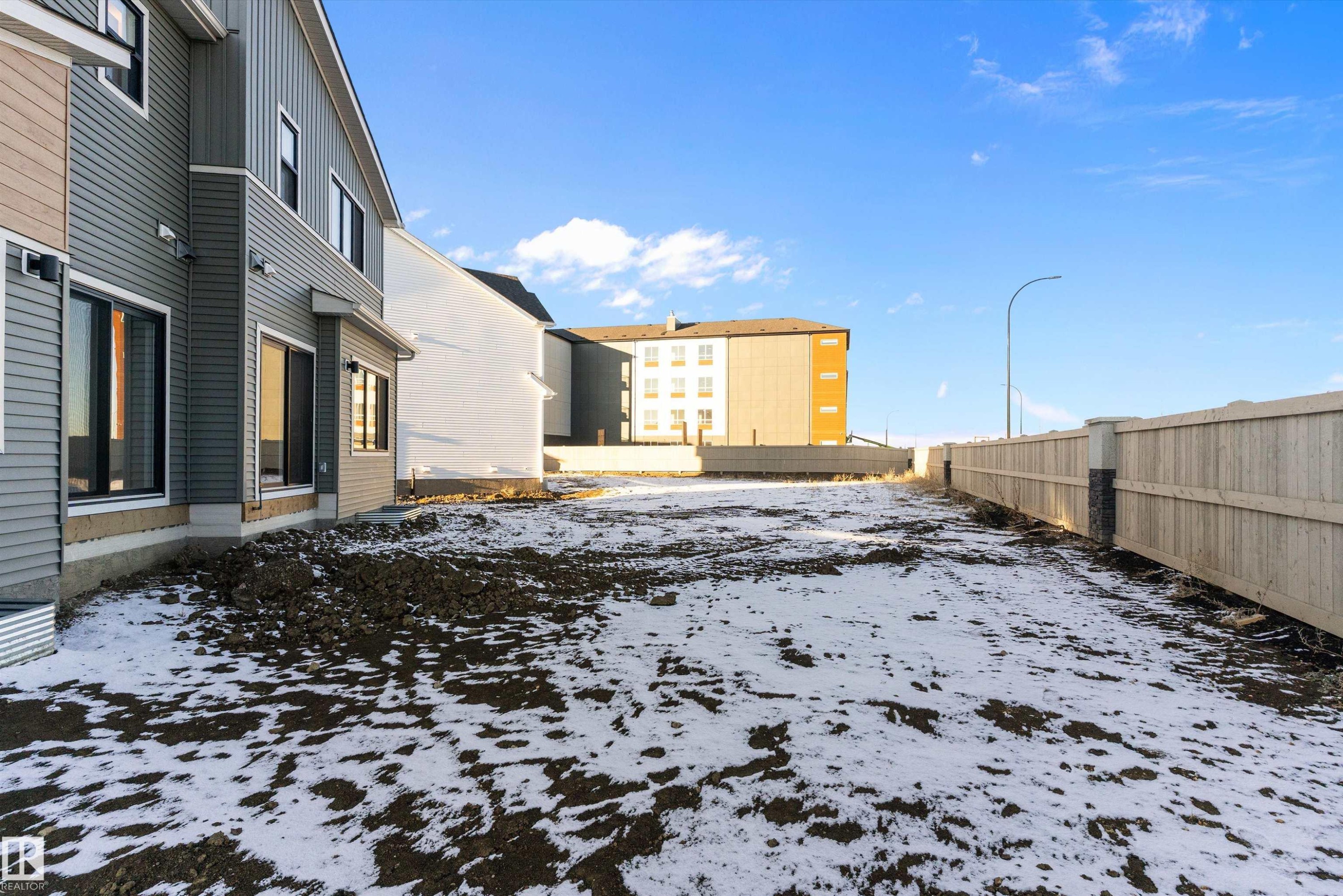 View of snowy yard - 823 Rowan Close, Edmonton, AB - Outdoor