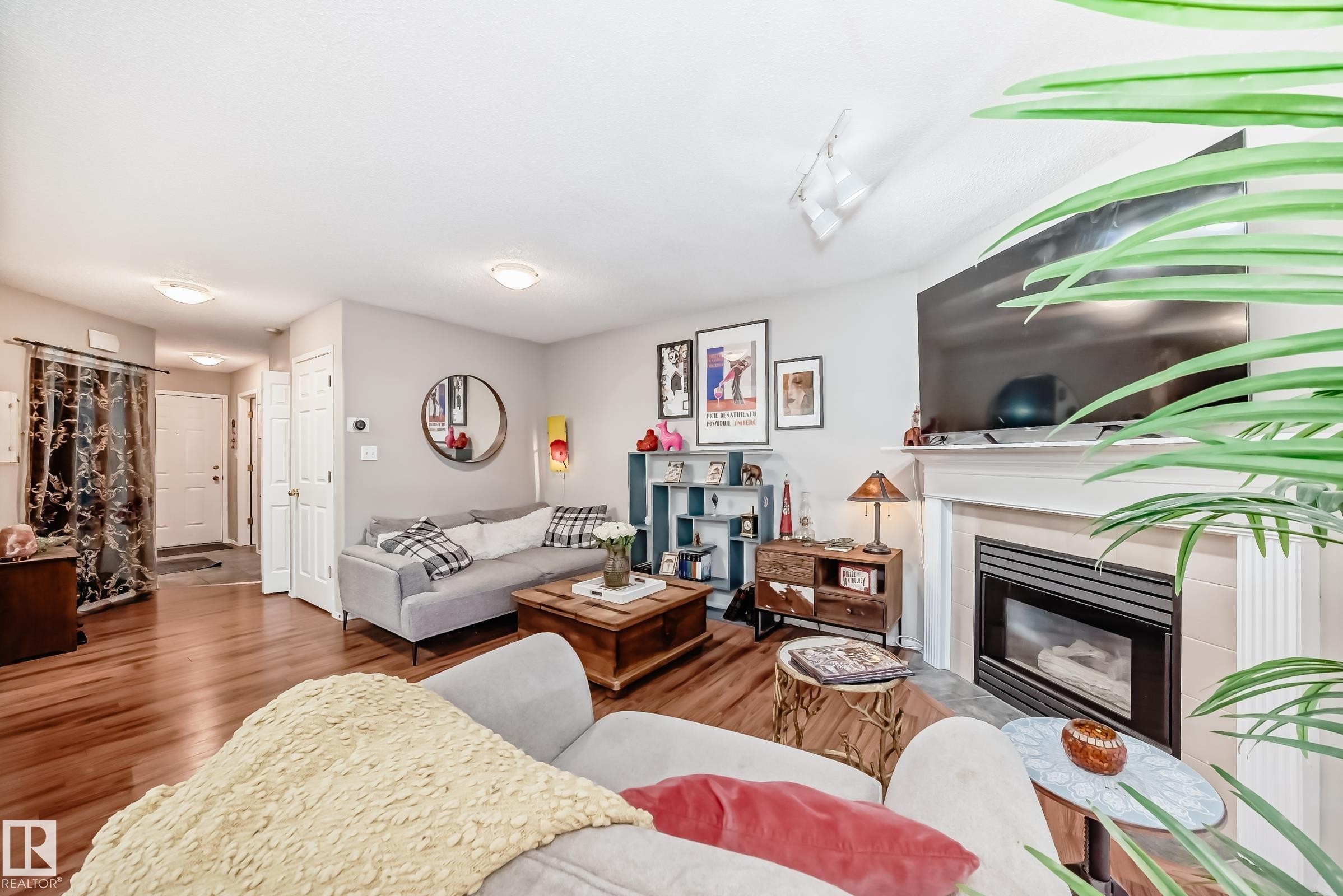 121 Bulyea Road, Edmonton, AB - Indoor Photo Showing Living Room With Fireplace