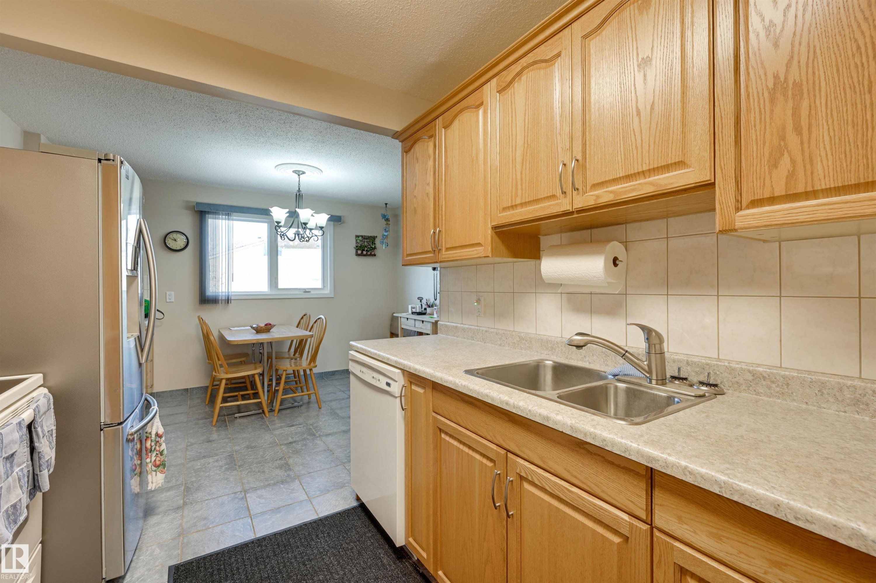 1064 Millbourne Road E, Edmonton, AB - Indoor Photo Showing Kitchen With Double Sink