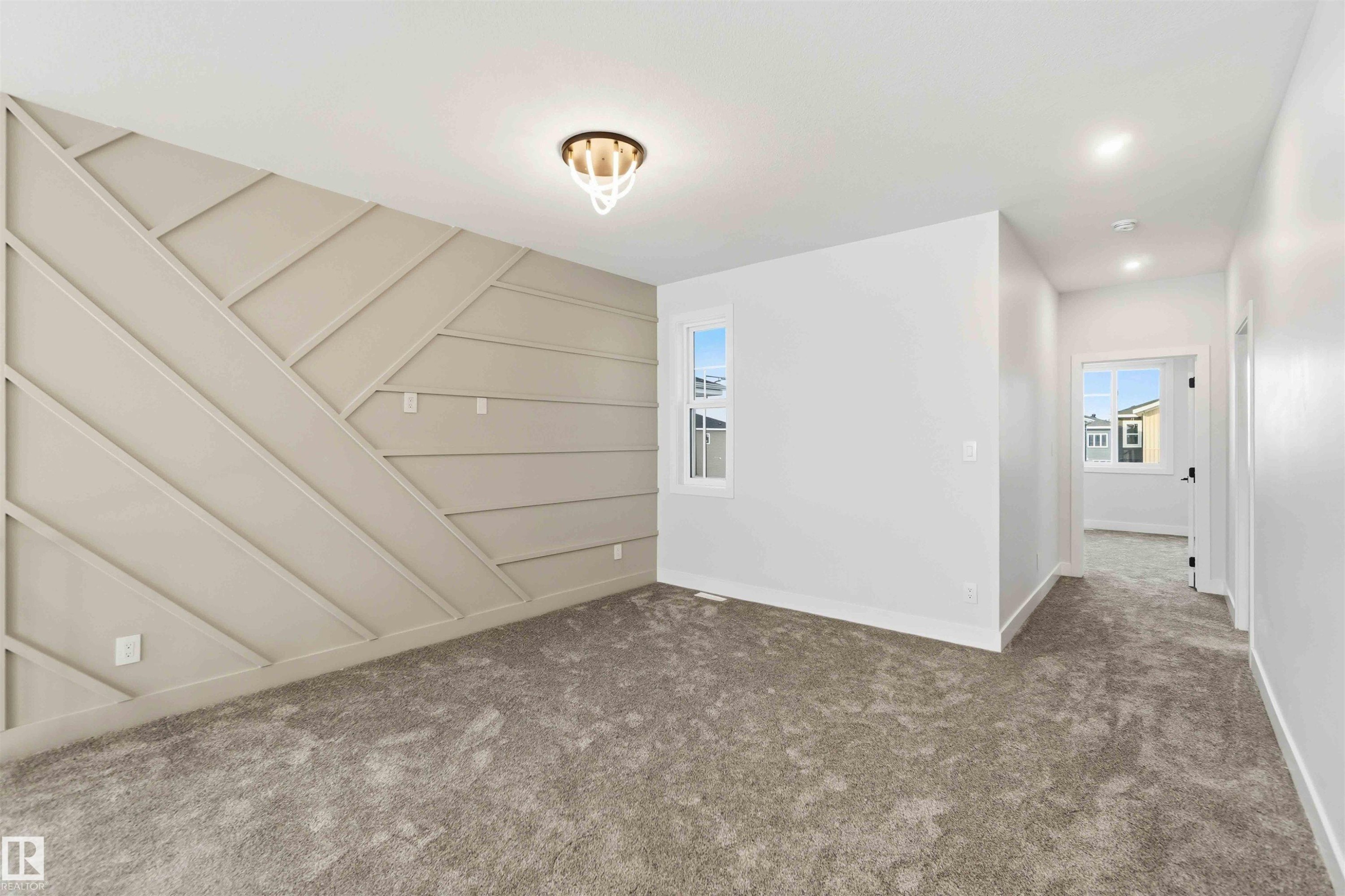 Spare room with carpet flooring and recessed lighting - 94 Eldridge Pointe, St. Albert, AB - Indoor Photo Showing Other Room
