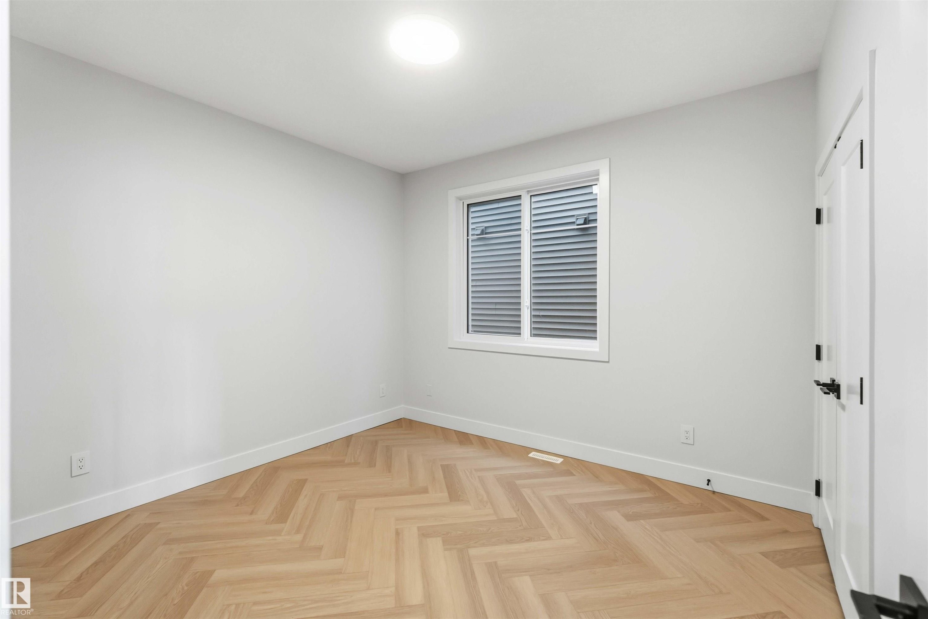 Unfurnished room featuring baseboards and parquet floors - 94 Eldridge Pointe, St. Albert, AB - Indoor Photo Showing Other Room