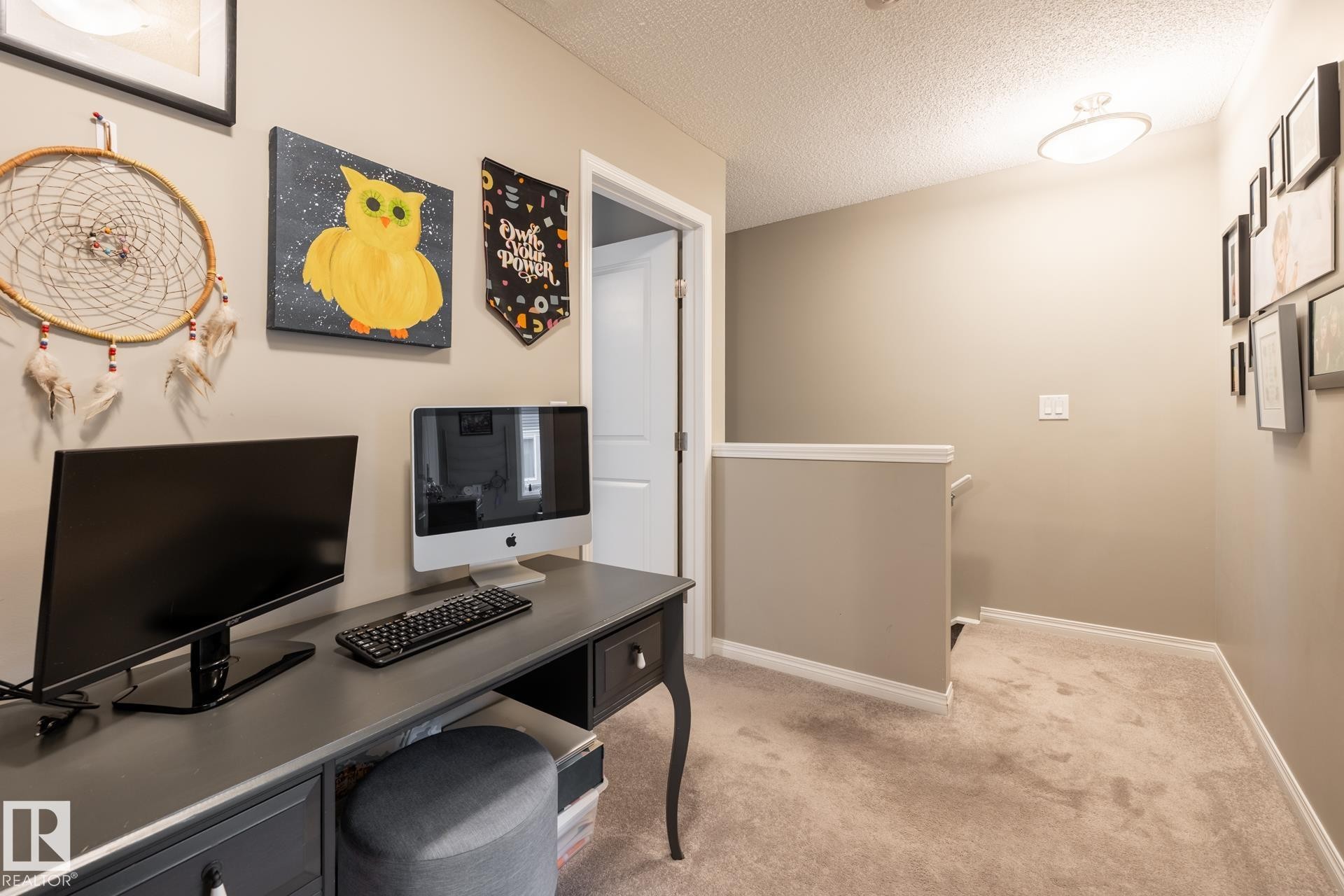 Home office with a textured ceiling and light carpet - 5 2072 Wonnacott Way, Edmonton, AB - Indoor