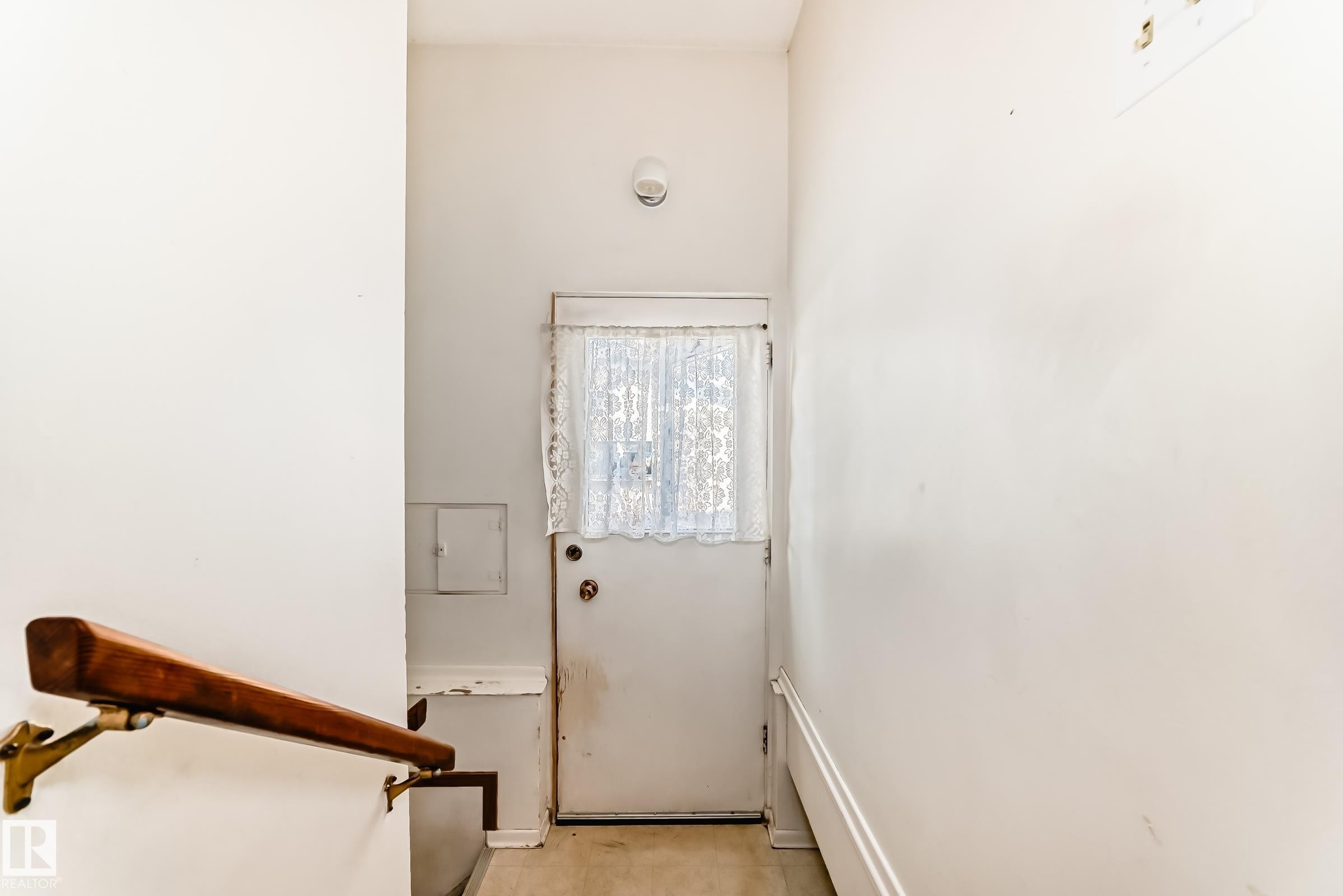 View of doorway to outside - Edmonton, AB - Indoor Photo Showing Other Room