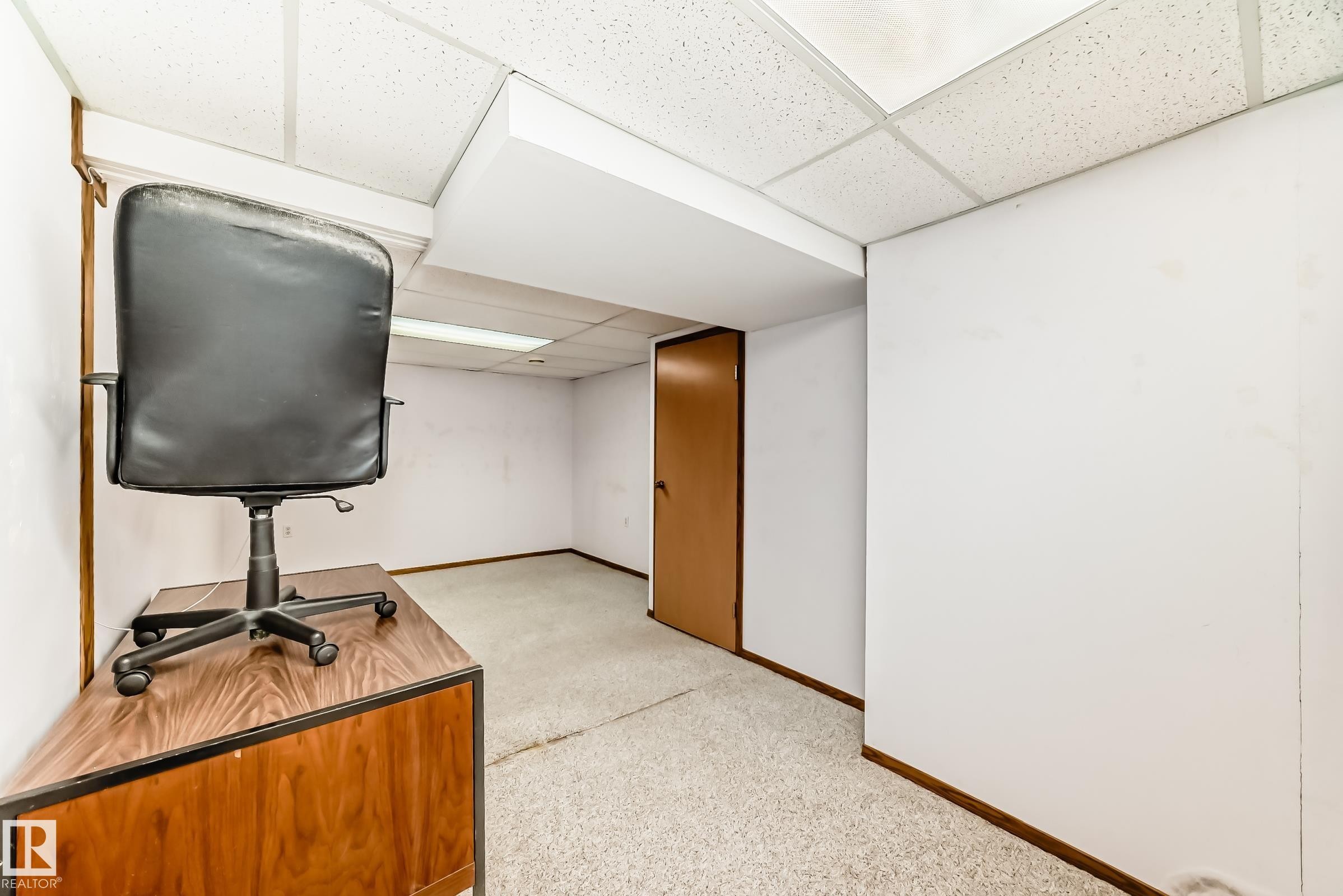 Home office featuring baseboards and a paneled ceiling - Edmonton, AB - Indoor